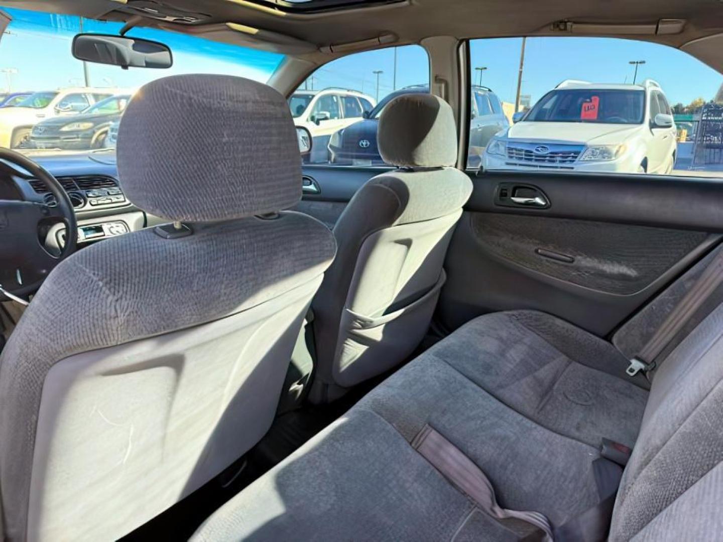 1997 MAROON /Gray Honda Accord (1HGCD5531VA) with an 22L I-4 regular unleaded engine, Manual transmission, located at 1175 N Woodruff Ave, Idaho Falls, ID, 83401, 43.506901, -111.999657 - At Timberline Auto, finding a great deal on your next vehicle is always easy! Our experienced sales staff's goal is to help find you the right vehicle at the right price! Our knowledgeable finance department has options for almost any credit score. We offer extended service contract options to prote - Photo#18