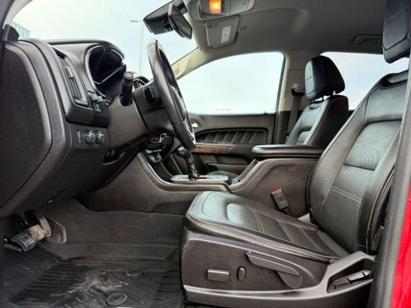 2021 Cayenne Red Tintcoat /Jet Black GMC Canyon 4WD Denali (1GTG6EEN5M1) with an V6, 3.6L engine, 8-speed automatic transmission, located at 1175 N Woodruff Ave, Idaho Falls, ID, 83401, 43.506901, -111.999657 - <b>Vehicle Details</b><br>Elevate every drive with this 2021 GMC Canyon Denali 4WD, now available in Idaho Falls, ID. This premium midsize truck brings bold style, refined comfort, and serious capability together in one impressive package. Powered by a V6, 3.6L gasoline engine, it delivers confident- Photo#11