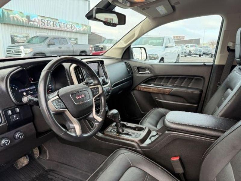 2021 Cayenne Red Tintcoat /Jet Black GMC Canyon 4WD Denali (1GTG6EEN5M1) with an V6, 3.6L engine, 8-speed automatic transmission, located at 1175 N Woodruff Ave, Idaho Falls, ID, 83401, 43.506901, -111.999657 - <b>Vehicle Details</b><br>Elevate every drive with this 2021 GMC Canyon Denali 4WD, now available in Idaho Falls, ID. This premium midsize truck brings bold style, refined comfort, and serious capability together in one impressive package. Powered by a V6, 3.6L gasoline engine, it delivers confident- Photo#12