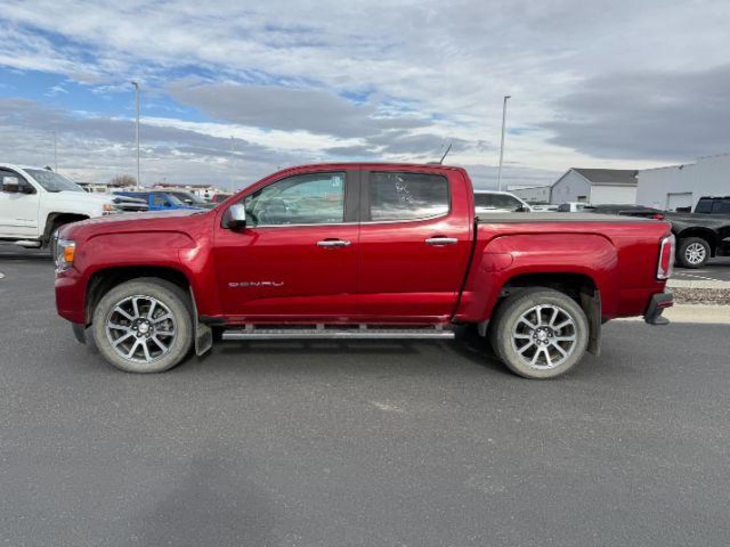 2021 Cayenne Red Tintcoat /Jet Black GMC Canyon (1GTG6EEN5M1) with an 36L V-6 gasoline direct injection engine, Automatic transmission, located at 1175 N Woodruff Ave, Idaho Falls, ID, 83401, 43.506901, -111.999657 - At Timberline Auto, finding a great deal on your next vehicle is always easy! Our experienced sales staff's goal is to help find you the right vehicle at the right price! Our knowledgeable finance department has options for almost any credit score. We offer extended service contract options to prote - Photo#1