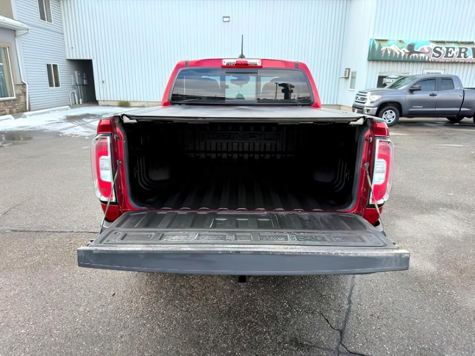 2021 RED /Jet Black GMC Canyon (1GTG6EEN5M1) with an 36L V-6 gasoline direct injection engine, Automatic transmission, located at 1175 N Woodruff Ave, Idaho Falls, ID, 83401, 43.506901, -111.999657 - At Timberline Auto, finding a great deal on your next vehicle is always easy! Our experienced sales staff's goal is to help find you the right vehicle at the right price! Our knowledgeable finance department has options for almost any credit score. We offer extended service contract options to prote - Photo#5