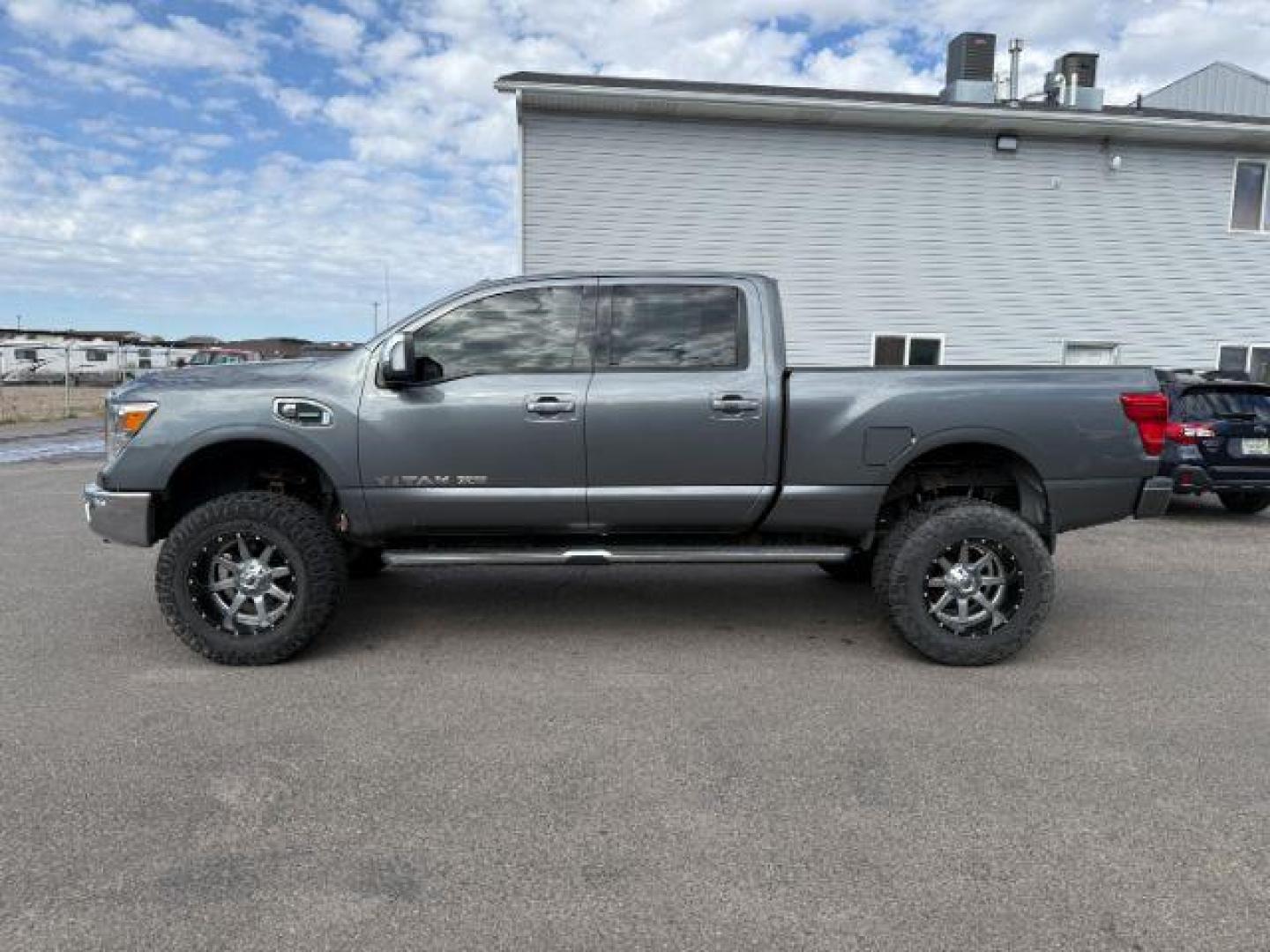 2017 Magnetic Black /Black Nissan TITAN XD (1N6BA1F46HN) with an 5L V-8 diesel direct injection engine, Automatic transmission, located at 1175 N Woodruff Ave, Idaho Falls, ID, 83401, 43.506901, -111.999657 - At Timberline Auto, finding a great deal on your next vehicle is always easy! Our experienced sales staff's goal is to help find you the right vehicle at the right price! Our knowledgeable finance department has options for almost any credit score. We offer extended service contract options to prote - Photo#25