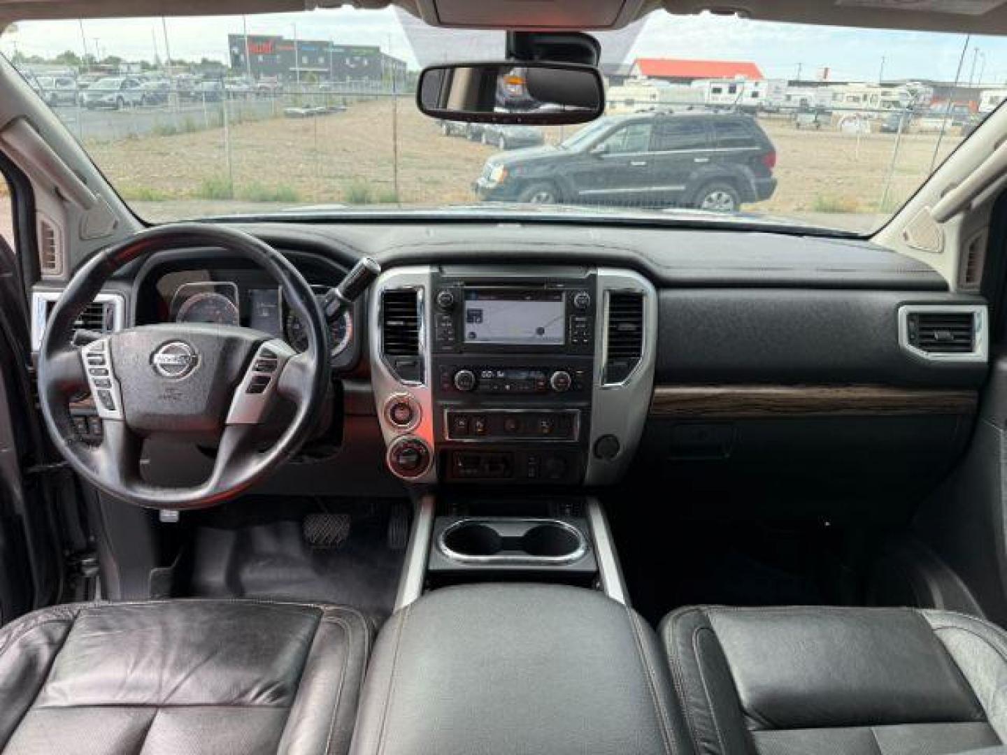 2017 Magnetic Black /Black Nissan TITAN XD (1N6BA1F46HN) with an 5L V-8 diesel direct injection engine, Automatic transmission, located at 1175 N Woodruff Ave, Idaho Falls, ID, 83401, 43.506901, -111.999657 - At Timberline Auto, finding a great deal on your next vehicle is always easy! Our experienced sales staff's goal is to help find you the right vehicle at the right price! Our knowledgeable finance department has options for almost any credit score. We offer extended service contract options to prote - Photo#46