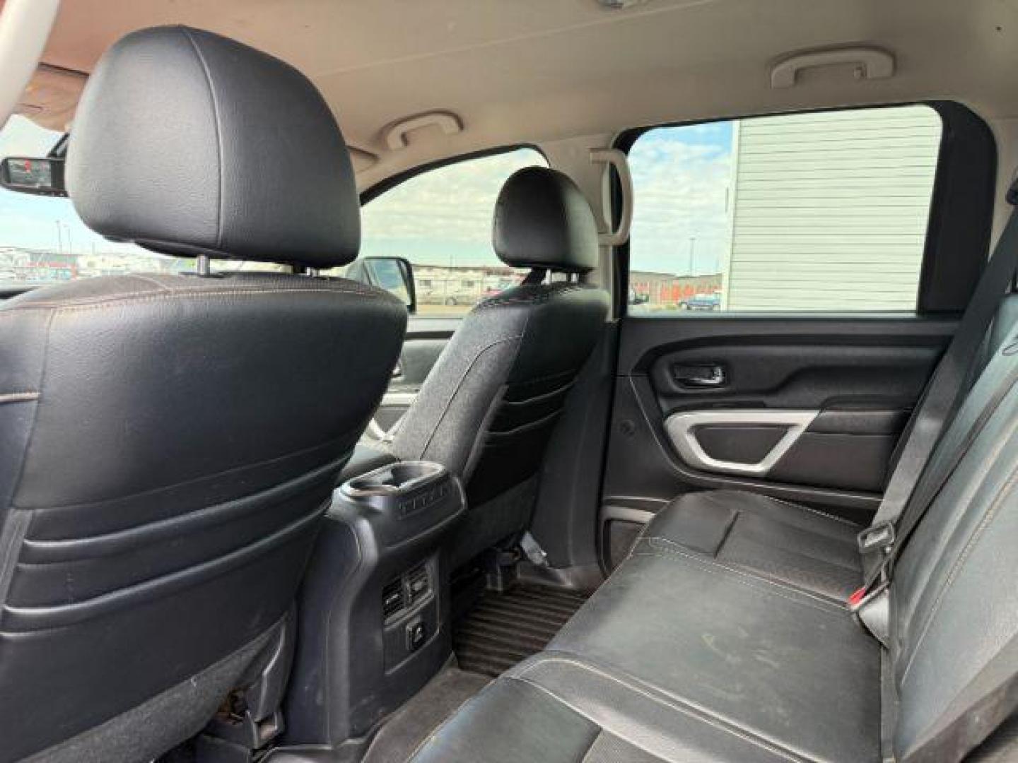 2017 Magnetic Black /Black Nissan TITAN XD (1N6BA1F46HN) with an 5L V-8 diesel direct injection engine, Automatic transmission, located at 1175 N Woodruff Ave, Idaho Falls, ID, 83401, 43.506901, -111.999657 - At Timberline Auto, finding a great deal on your next vehicle is always easy! Our experienced sales staff's goal is to help find you the right vehicle at the right price! Our knowledgeable finance department has options for almost any credit score. We offer extended service contract options to prote - Photo#47