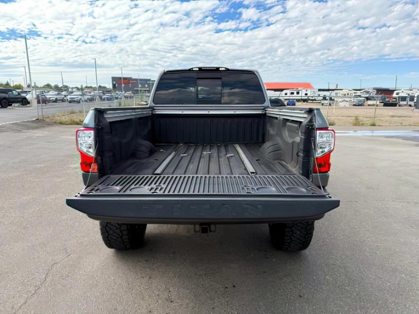 2017 Magnetic Black /Black Nissan TITAN XD (1N6BA1F46HN) with an 5L V-8 diesel direct injection engine, Automatic transmission, located at 1175 N Woodruff Ave, Idaho Falls, ID, 83401, 43.506901, -111.999657 - At Timberline Auto, finding a great deal on your next vehicle is always easy! Our experienced sales staff's goal is to help find you the right vehicle at the right price! Our knowledgeable finance department has options for almost any credit score. We offer extended service contract options to prote - Photo#3