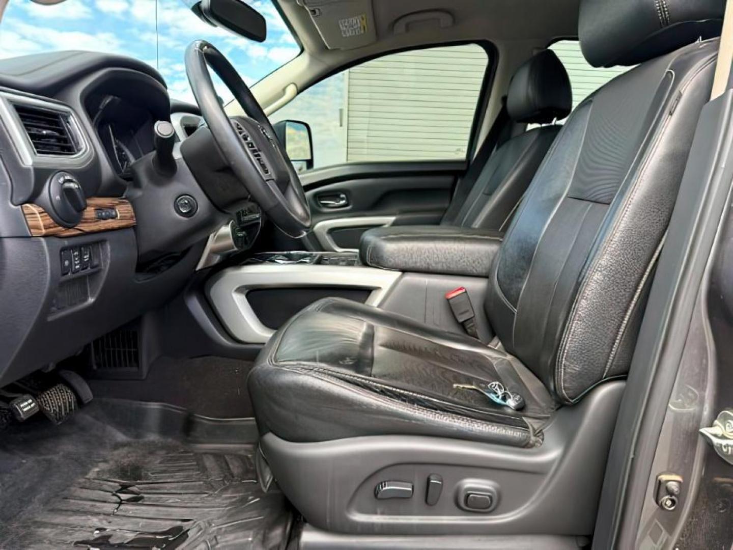 2017 Magnetic Black /Black Nissan TITAN XD (1N6BA1F46HN) with an 5L V-8 diesel direct injection engine, Automatic transmission, located at 1175 N Woodruff Ave, Idaho Falls, ID, 83401, 43.506901, -111.999657 - At Timberline Auto, finding a great deal on your next vehicle is always easy! Our experienced sales staff's goal is to help find you the right vehicle at the right price! Our knowledgeable finance department has options for almost any credit score. We offer extended service contract options to prote - Photo#11