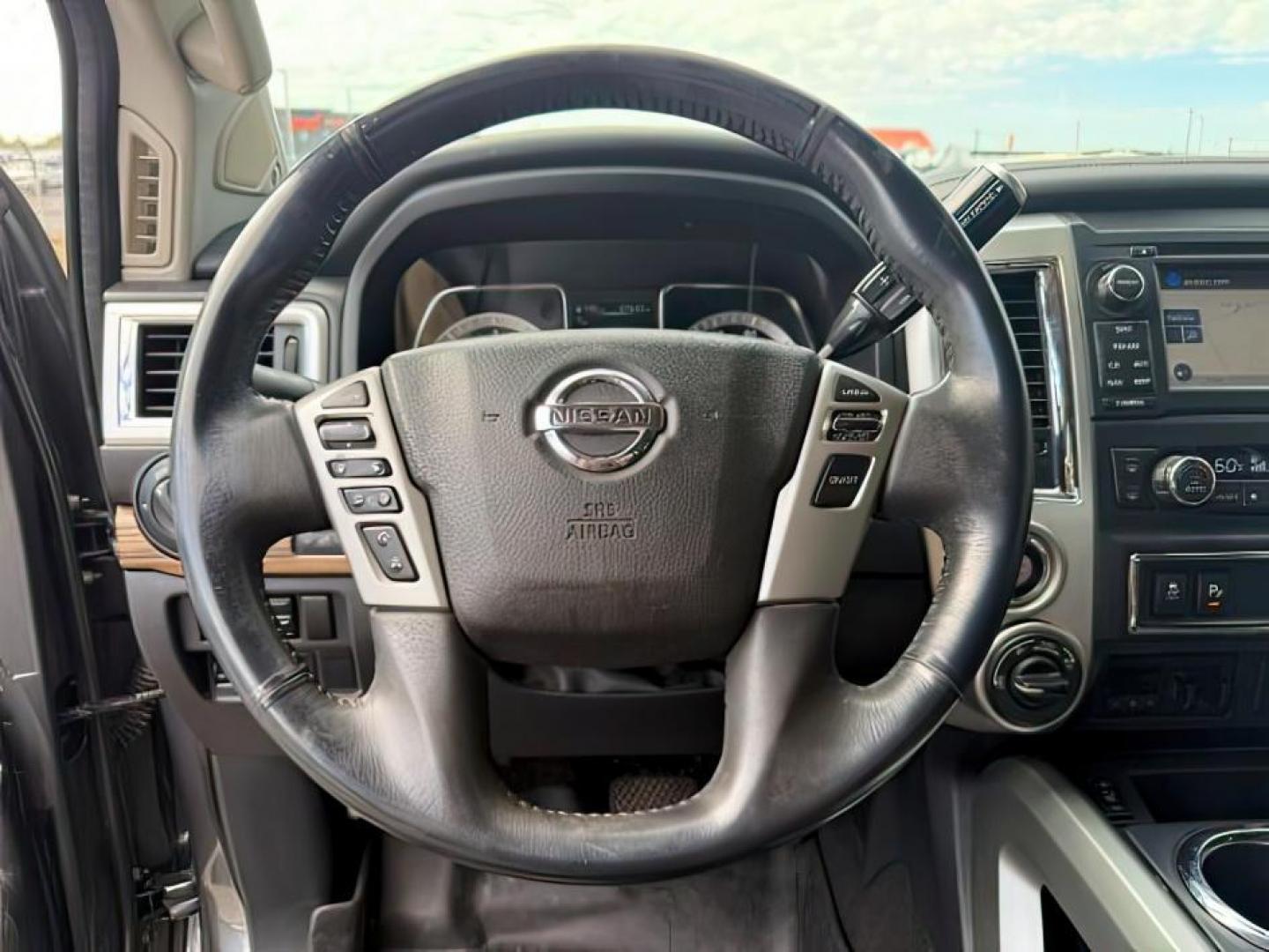 2017 Magnetic Black /Black Nissan TITAN XD (1N6BA1F46HN) with an 5L V-8 diesel direct injection engine, Automatic transmission, located at 1175 N Woodruff Ave, Idaho Falls, ID, 83401, 43.506901, -111.999657 - At Timberline Auto, finding a great deal on your next vehicle is always easy! Our experienced sales staff's goal is to help find you the right vehicle at the right price! Our knowledgeable finance department has options for almost any credit score. We offer extended service contract options to prote - Photo#13