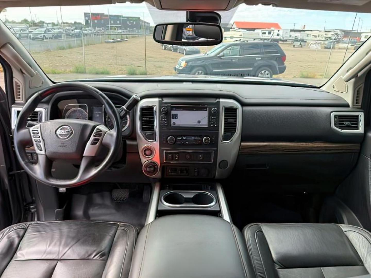 2017 Magnetic Black /Black Nissan TITAN XD (1N6BA1F46HN) with an 5L V-8 diesel direct injection engine, Automatic transmission, located at 1175 N Woodruff Ave, Idaho Falls, ID, 83401, 43.506901, -111.999657 - At Timberline Auto, finding a great deal on your next vehicle is always easy! Our experienced sales staff's goal is to help find you the right vehicle at the right price! Our knowledgeable finance department has options for almost any credit score. We offer extended service contract options to prote - Photo#22