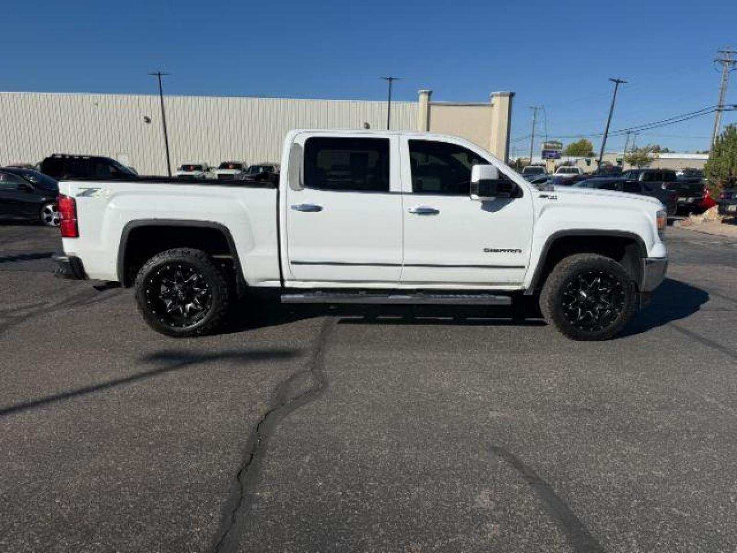 2015 Summit White /Jet Black GMC Sierra 1500 (3GTU2VEC2FG) with an 53 VORTEC engine, Automatic transmission, located at 1175 N Woodruff Ave, Idaho Falls, ID, 83401, 43.506901, -111.999657 - At Timberline Auto, finding a great deal on your next vehicle is always easy! Our experienced sales staff's goal is to help find you the right vehicle at the right price! Our knowledgeable finance department has options for almost any credit score. We offer extended service contract options to prote - Photo#24