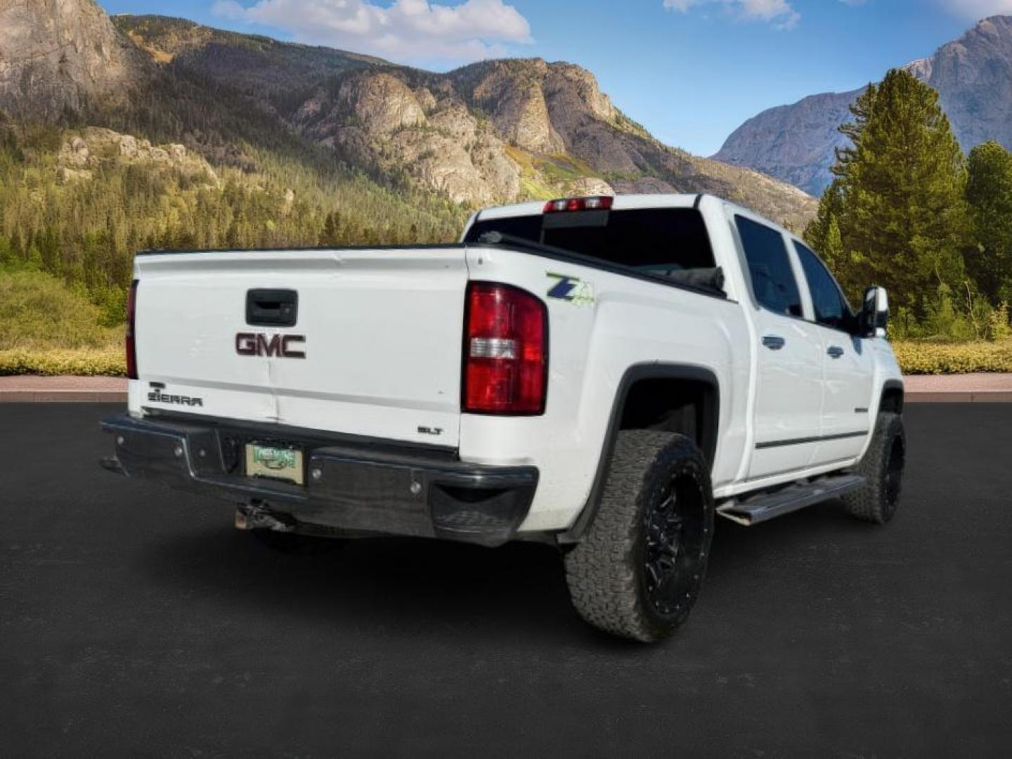 2015 Summit White /Jet Black GMC Sierra 1500 (3GTU2VEC2FG) with an 53 VORTEC engine, Automatic transmission, located at 1175 N Woodruff Ave, Idaho Falls, ID, 83401, 43.506901, -111.999657 - At Timberline Auto, finding a great deal on your next vehicle is always easy! Our experienced sales staff's goal is to help find you the right vehicle at the right price! Our knowledgeable finance department has options for almost any credit score. We offer extended service contract options to prote - Photo#4
