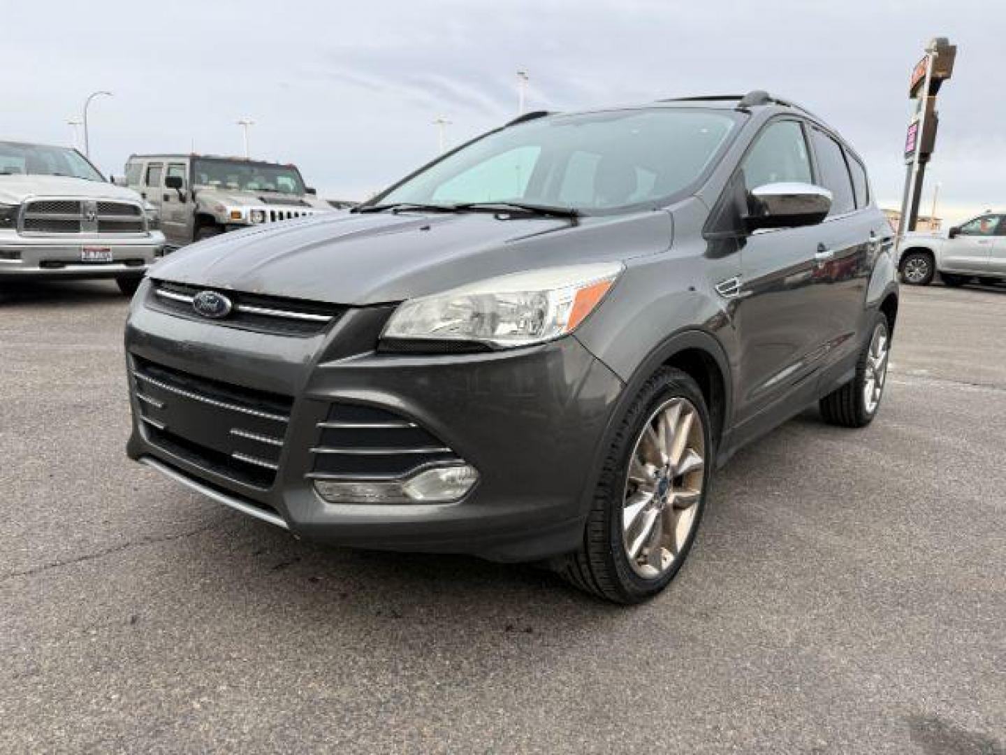 2015 GRAY /Charcoal Black Ford Escape (1FMCU9G91FU) with an EcoBoost 2L I-4 gasoline direct injection engine, Automatic transmission, located at 1175 N Woodruff Ave, Idaho Falls, ID, 83401, 43.506901, -111.999657 - At Timberline Auto, finding a great deal on your next vehicle is always easy! Our experienced sales staff's goal is to help find you the right vehicle at the right price! Our knowledgeable finance department has options for almost any credit score. We offer extended service contract options to prote - Photo#25