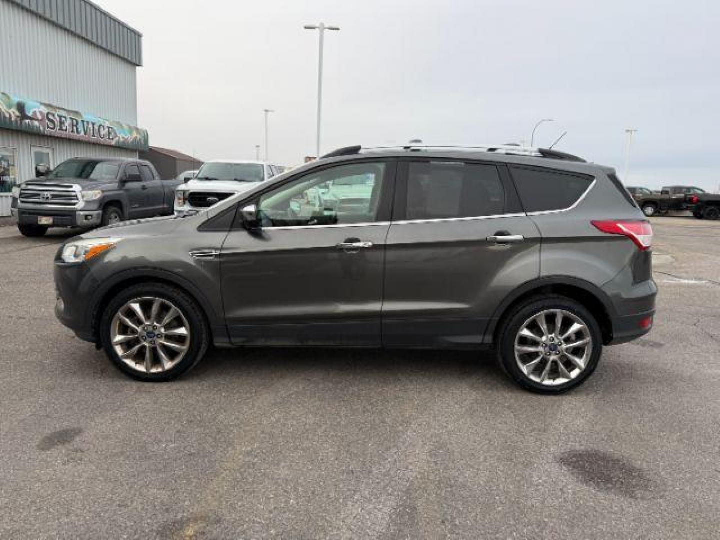 2015 GRAY /Charcoal Black Ford Escape (1FMCU9G91FU) with an EcoBoost 2L I-4 gasoline direct injection engine, Automatic transmission, located at 1175 N Woodruff Ave, Idaho Falls, ID, 83401, 43.506901, -111.999657 - At Timberline Auto, finding a great deal on your next vehicle is always easy! Our experienced sales staff's goal is to help find you the right vehicle at the right price! Our knowledgeable finance department has options for almost any credit score. We offer extended service contract options to prote - Photo#26