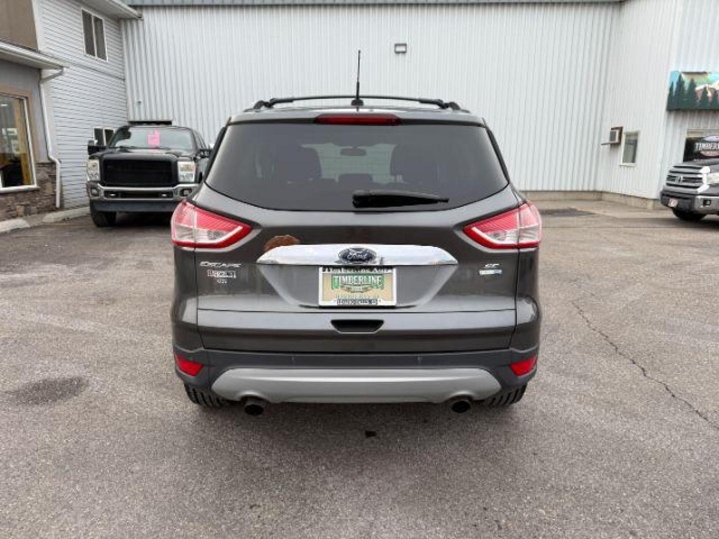 2015 GRAY /Charcoal Black Ford Escape (1FMCU9G91FU) with an EcoBoost 2L I-4 gasoline direct injection engine, Automatic transmission, located at 1175 N Woodruff Ave, Idaho Falls, ID, 83401, 43.506901, -111.999657 - At Timberline Auto, finding a great deal on your next vehicle is always easy! Our experienced sales staff's goal is to help find you the right vehicle at the right price! Our knowledgeable finance department has options for almost any credit score. We offer extended service contract options to prote - Photo#28