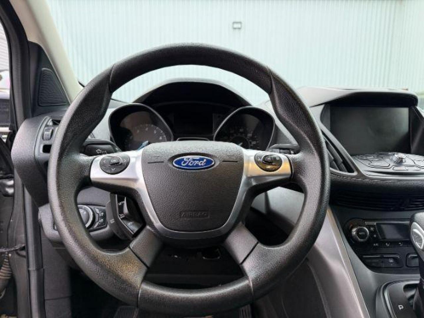 2015 GRAY /Charcoal Black Ford Escape (1FMCU9G91FU) with an EcoBoost 2L I-4 gasoline direct injection engine, Automatic transmission, located at 1175 N Woodruff Ave, Idaho Falls, ID, 83401, 43.506901, -111.999657 - At Timberline Auto, finding a great deal on your next vehicle is always easy! Our experienced sales staff's goal is to help find you the right vehicle at the right price! Our knowledgeable finance department has options for almost any credit score. We offer extended service contract options to prote - Photo#41