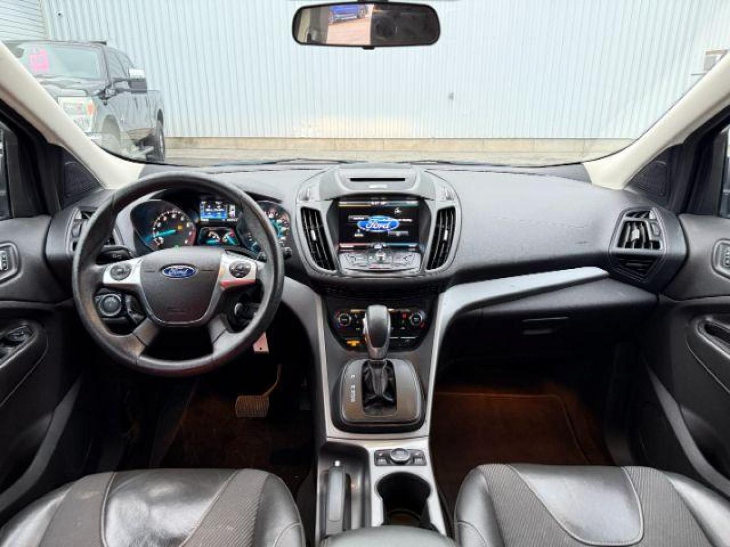 2015 GRAY /Charcoal Black Ford Escape (1FMCU9G91FU) with an EcoBoost 2L I-4 gasoline direct injection engine, Automatic transmission, located at 1175 N Woodruff Ave, Idaho Falls, ID, 83401, 43.506901, -111.999657 - At Timberline Auto, finding a great deal on your next vehicle is always easy! Our experienced sales staff's goal is to help find you the right vehicle at the right price! Our knowledgeable finance department has options for almost any credit score. We offer extended service contract options to prote - Photo#47