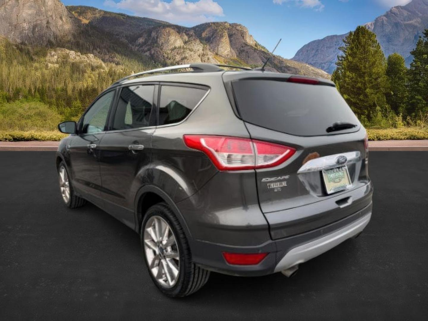 2015 GRAY /Charcoal Black Ford Escape (1FMCU9G91FU) with an EcoBoost 2L I-4 gasoline direct injection engine, Automatic transmission, located at 1175 N Woodruff Ave, Idaho Falls, ID, 83401, 43.506901, -111.999657 - At Timberline Auto, finding a great deal on your next vehicle is always easy! Our experienced sales staff's goal is to help find you the right vehicle at the right price! Our knowledgeable finance department has options for almost any credit score. We offer extended service contract options to prote - Photo#2