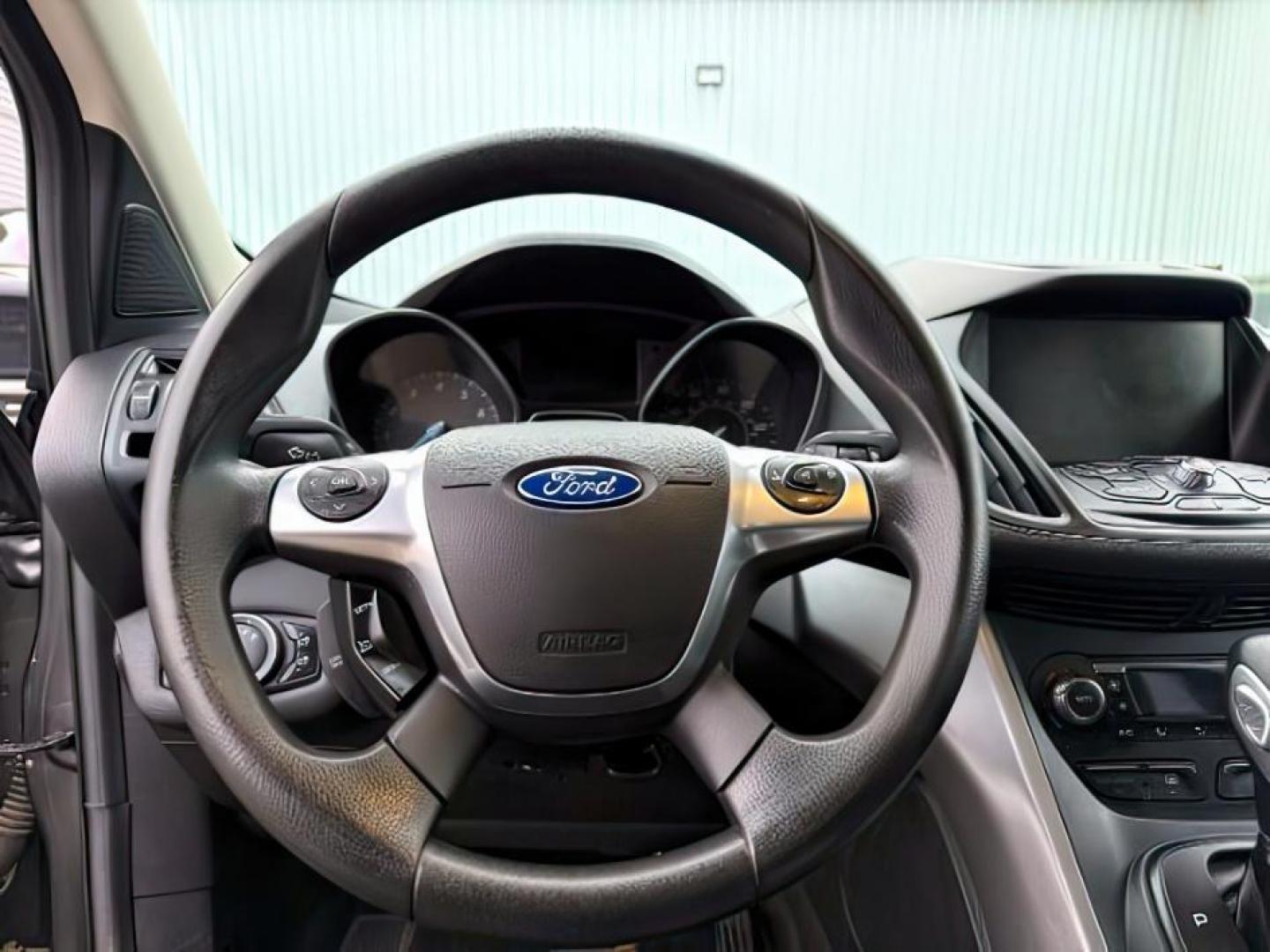 2015 GRAY /Charcoal Black Ford Escape (1FMCU9G91FU) with an EcoBoost 2L I-4 gasoline direct injection engine, Automatic transmission, located at 1175 N Woodruff Ave, Idaho Falls, ID, 83401, 43.506901, -111.999657 - At Timberline Auto, finding a great deal on your next vehicle is always easy! Our experienced sales staff's goal is to help find you the right vehicle at the right price! Our knowledgeable finance department has options for almost any credit score. We offer extended service contract options to prote - Photo#16