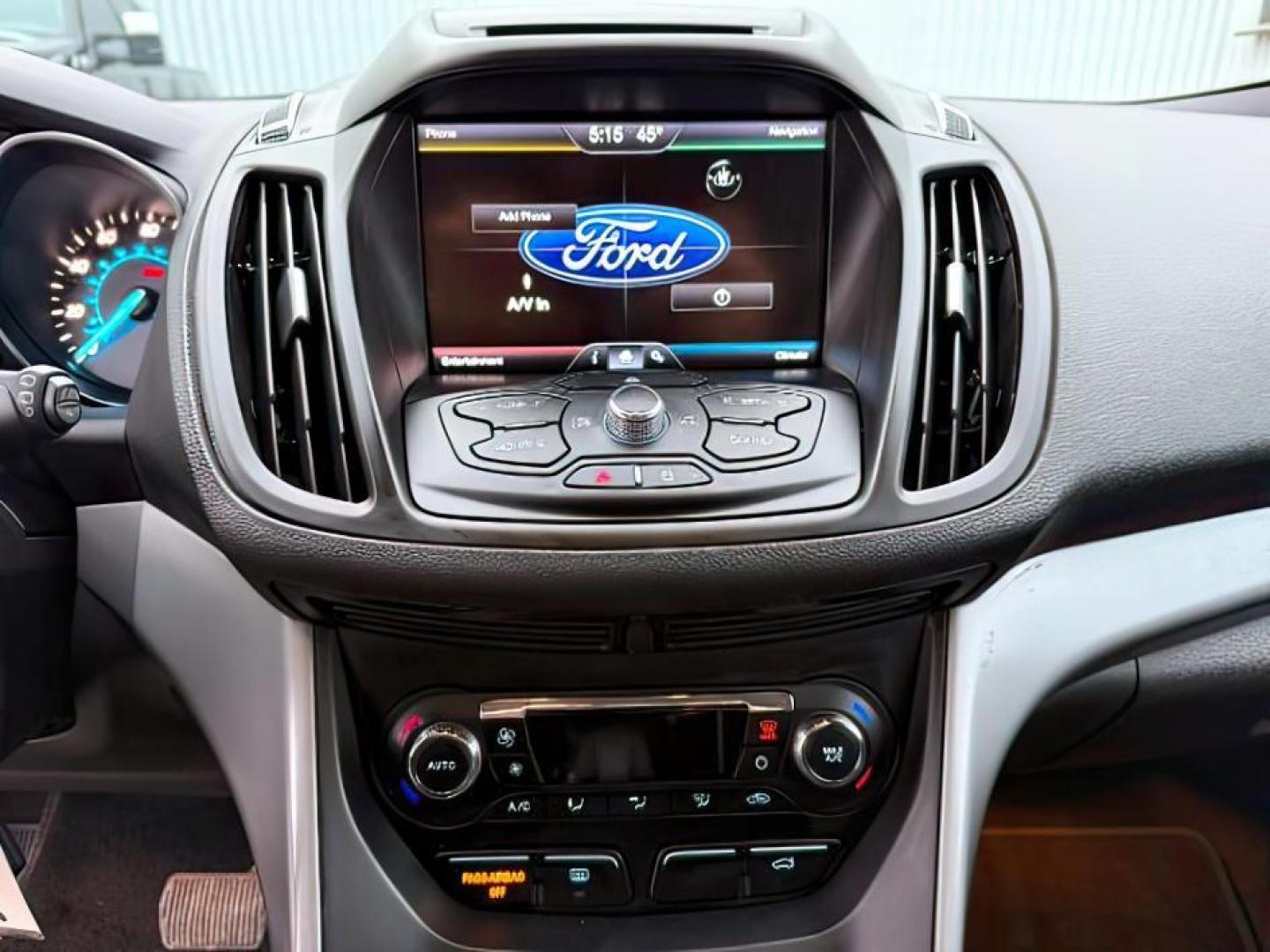 2015 GRAY /Charcoal Black Ford Escape (1FMCU9G91FU) with an EcoBoost 2L I-4 gasoline direct injection engine, Automatic transmission, located at 1175 N Woodruff Ave, Idaho Falls, ID, 83401, 43.506901, -111.999657 - At Timberline Auto, finding a great deal on your next vehicle is always easy! Our experienced sales staff's goal is to help find you the right vehicle at the right price! Our knowledgeable finance department has options for almost any credit score. We offer extended service contract options to prote - Photo#17