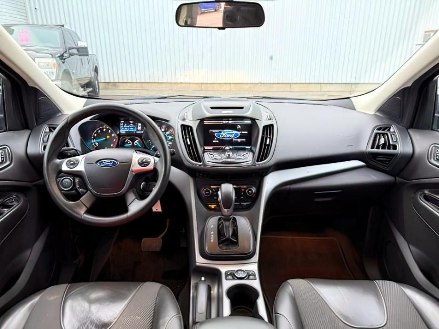 2015 GRAY /Charcoal Black Ford Escape (1FMCU9G91FU) with an EcoBoost 2L I-4 gasoline direct injection engine, Automatic transmission, located at 1175 N Woodruff Ave, Idaho Falls, ID, 83401, 43.506901, -111.999657 - At Timberline Auto, finding a great deal on your next vehicle is always easy! Our experienced sales staff's goal is to help find you the right vehicle at the right price! Our knowledgeable finance department has options for almost any credit score. We offer extended service contract options to prote - Photo#22