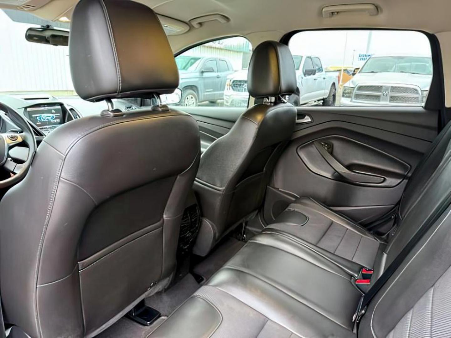 2015 GRAY /Charcoal Black Ford Escape (1FMCU9G91FU) with an EcoBoost 2L I-4 gasoline direct injection engine, Automatic transmission, located at 1175 N Woodruff Ave, Idaho Falls, ID, 83401, 43.506901, -111.999657 - At Timberline Auto, finding a great deal on your next vehicle is always easy! Our experienced sales staff's goal is to help find you the right vehicle at the right price! Our knowledgeable finance department has options for almost any credit score. We offer extended service contract options to prote - Photo#23