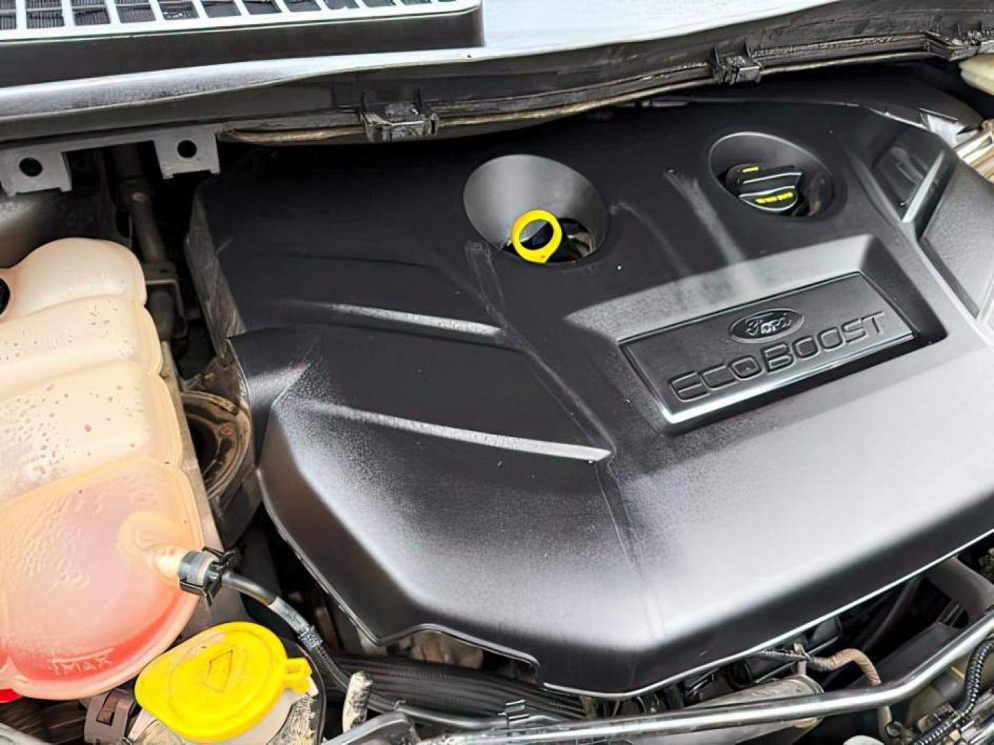 2015 GRAY /Charcoal Black Ford Escape (1FMCU9G91FU) with an EcoBoost 2L I-4 gasoline direct injection engine, Automatic transmission, located at 1175 N Woodruff Ave, Idaho Falls, ID, 83401, 43.506901, -111.999657 - At Timberline Auto, finding a great deal on your next vehicle is always easy! Our experienced sales staff's goal is to help find you the right vehicle at the right price! Our knowledgeable finance department has options for almost any credit score. We offer extended service contract options to prote - Photo#24