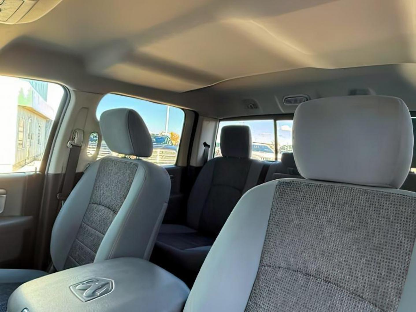 2013 BLACK /CLOTH Ram 1500 (1C6RR7LT6DS) with an 57 engine, Automatic transmission, located at 1175 N Woodruff Ave, Idaho Falls, ID, 83401, 43.506901, -111.999657 - At Timberline Auto, finding a great deal on your next vehicle is always easy! Our experienced sales staff's goal is to help find you the right vehicle at the right price! Our knowledgeable finance department has options for almost any credit score. We offer extended service contract options to prote - Photo#16