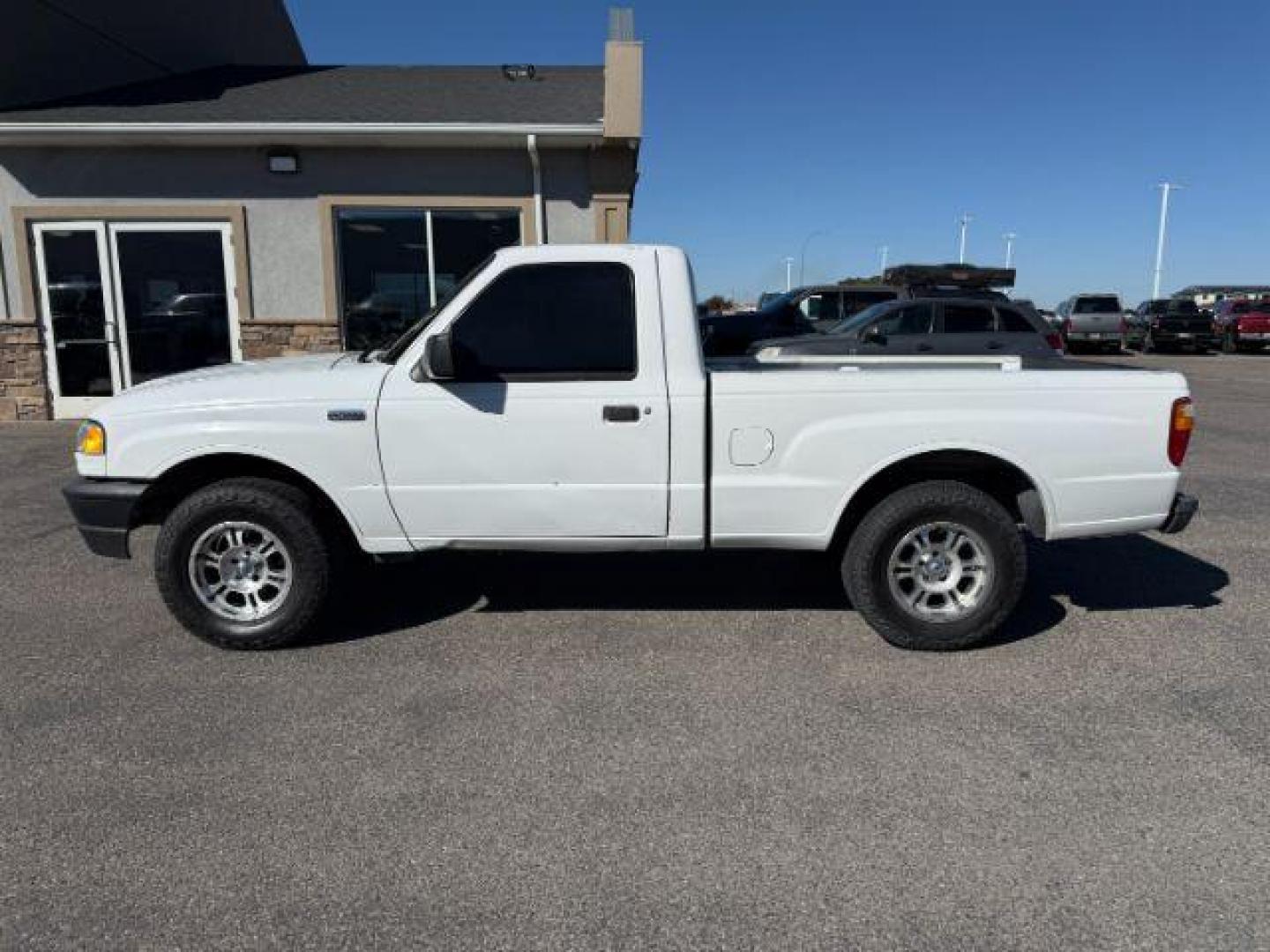 2008 WHITE /CLOTH Mazda B2300 (4F4YR12DX8P) with an I4 24 engine, Manual transmission, located at 1175 N Woodruff Ave, Idaho Falls, ID, 83401, 43.506901, -111.999657 - At Timberline Auto, finding a great deal on your next vehicle is always easy! Our experienced sales staff's goal is to help find you the right vehicle at the right price! Our knowledgeable finance department has options for almost any credit score. We offer extended service contract options to prote - Photo#0