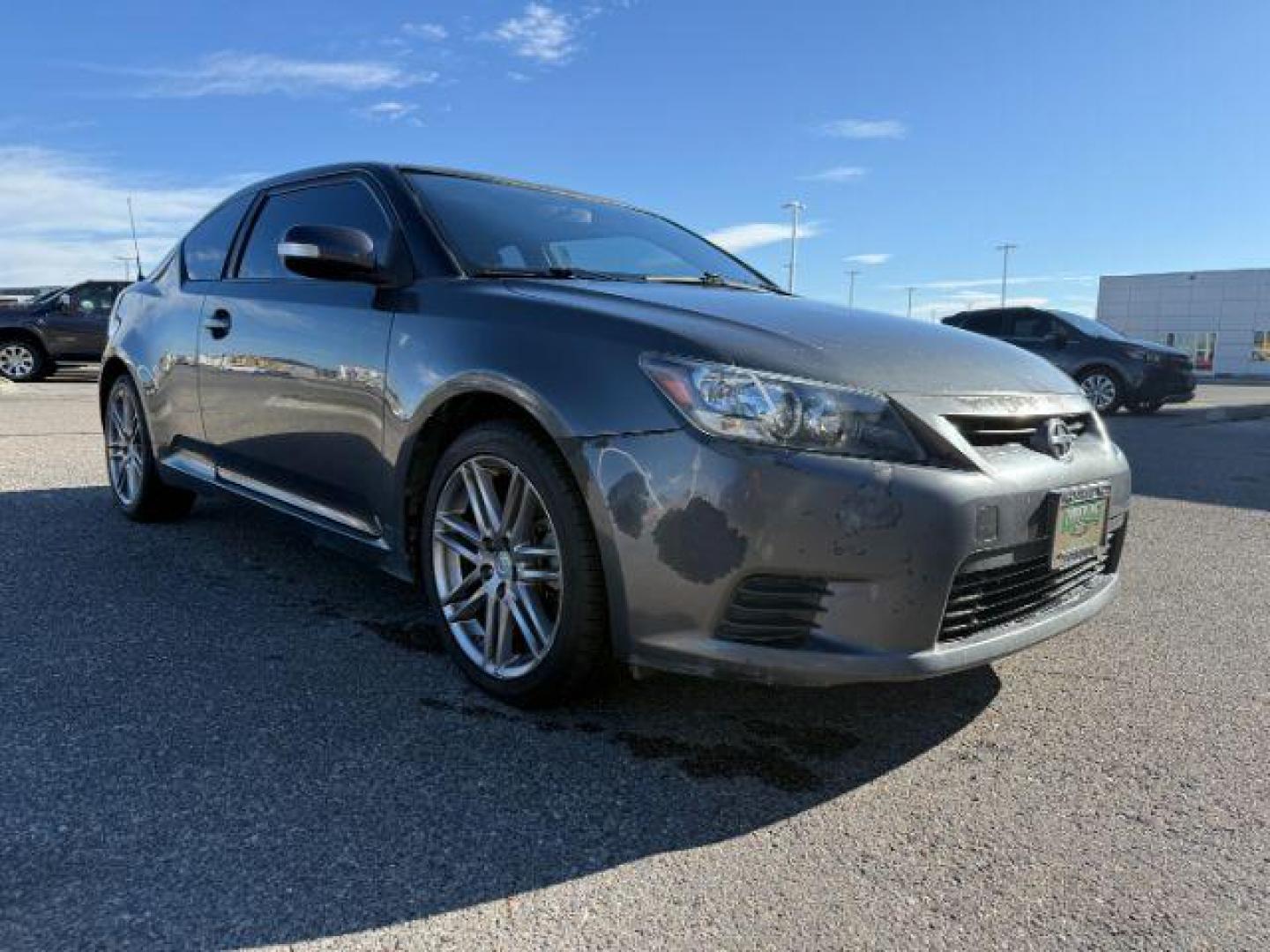 2012 Magnetic Gray Metallic /Dark Charcoal Scion tC (JTKJF5C78C3) with an 25L I-4 DOHC engine, Automatic transmission, located at 1175 N Woodruff Ave, Idaho Falls, ID, 83401, 43.506901, -111.999657 - At Timberline Auto, finding a great deal on your next vehicle is always easy! Our experienced sales staff's goal is to help find you the right vehicle at the right price! Our knowledgeable finance department has options for almost any credit score. We offer extended service contract options to prote - Photo#25