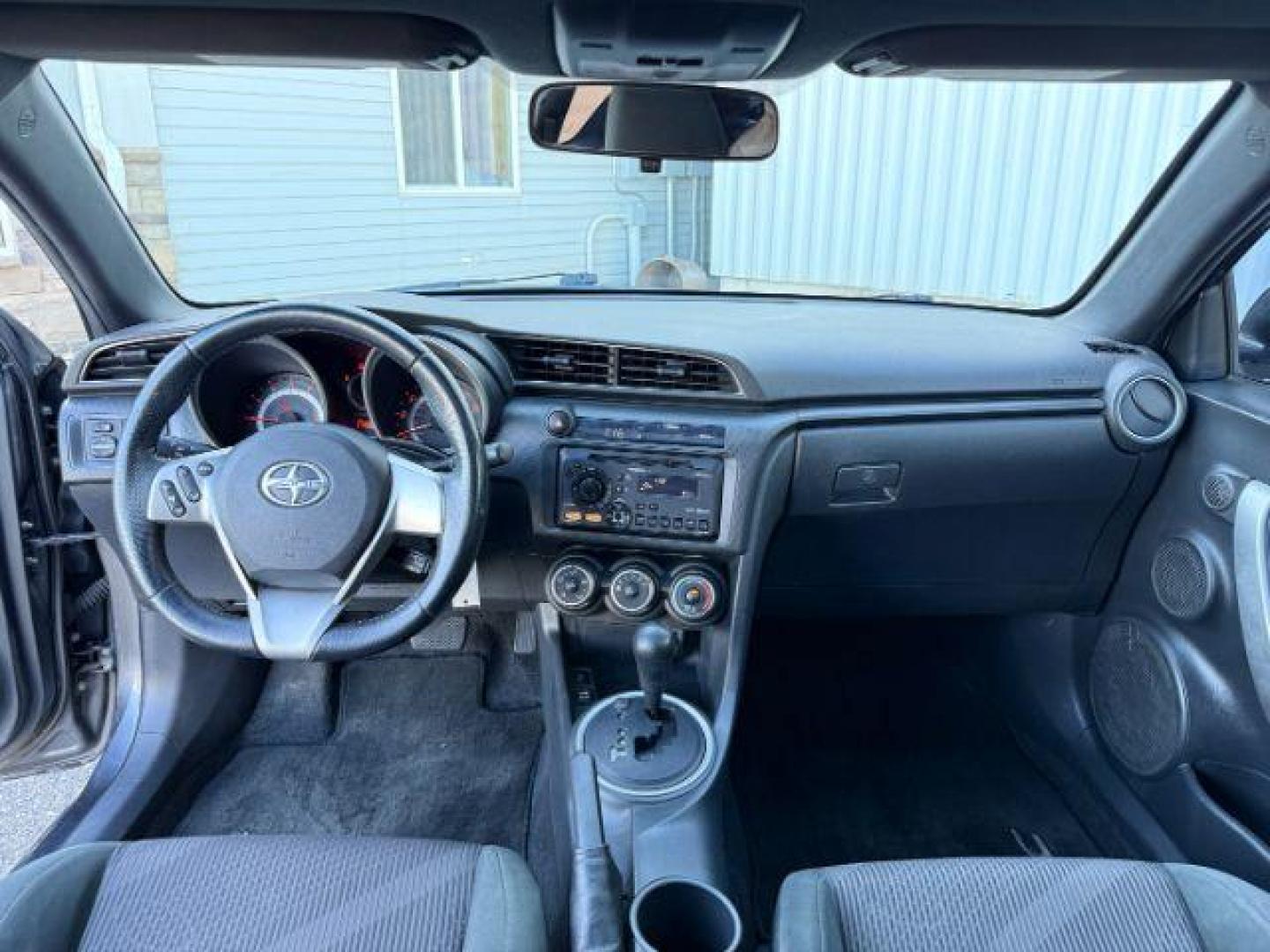 2012 Magnetic Gray Metallic /Dark Charcoal Scion tC (JTKJF5C78C3) with an 25L I-4 DOHC engine, Automatic transmission, located at 1175 N Woodruff Ave, Idaho Falls, ID, 83401, 43.506901, -111.999657 - At Timberline Auto, finding a great deal on your next vehicle is always easy! Our experienced sales staff's goal is to help find you the right vehicle at the right price! Our knowledgeable finance department has options for almost any credit score. We offer extended service contract options to prote - Photo#35