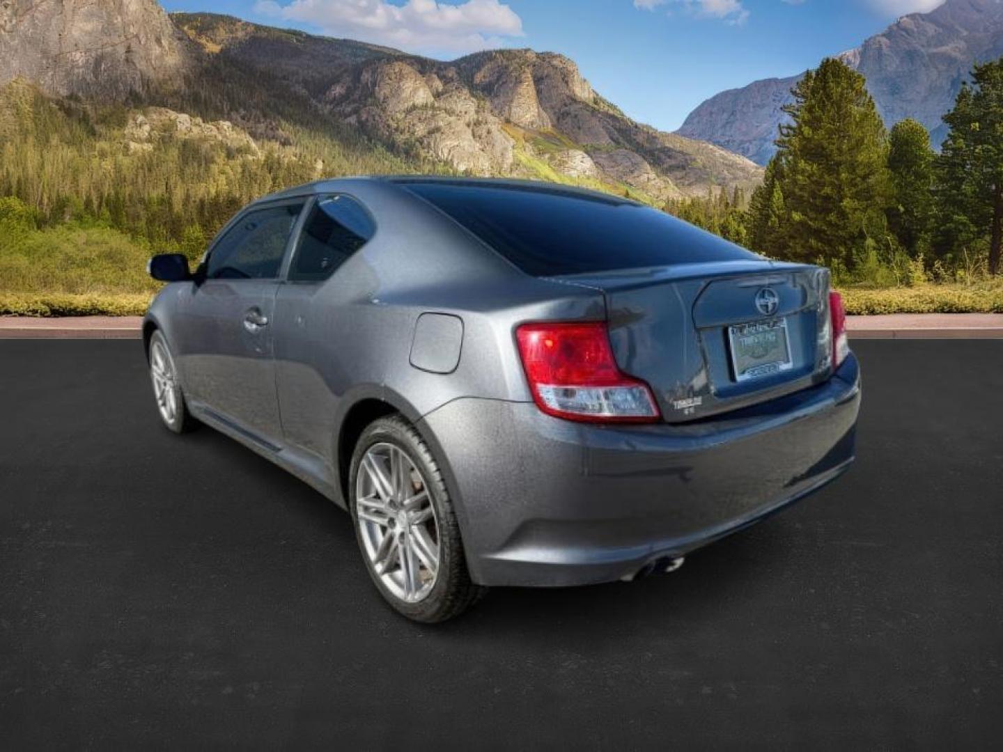 2012 Magnetic Gray Metallic /Dark Charcoal Scion tC (JTKJF5C78C3) with an 25L I-4 DOHC engine, Automatic transmission, located at 1175 N Woodruff Ave, Idaho Falls, ID, 83401, 43.506901, -111.999657 - At Timberline Auto, finding a great deal on your next vehicle is always easy! Our experienced sales staff's goal is to help find you the right vehicle at the right price! Our knowledgeable finance department has options for almost any credit score. We offer extended service contract options to prote - Photo#2