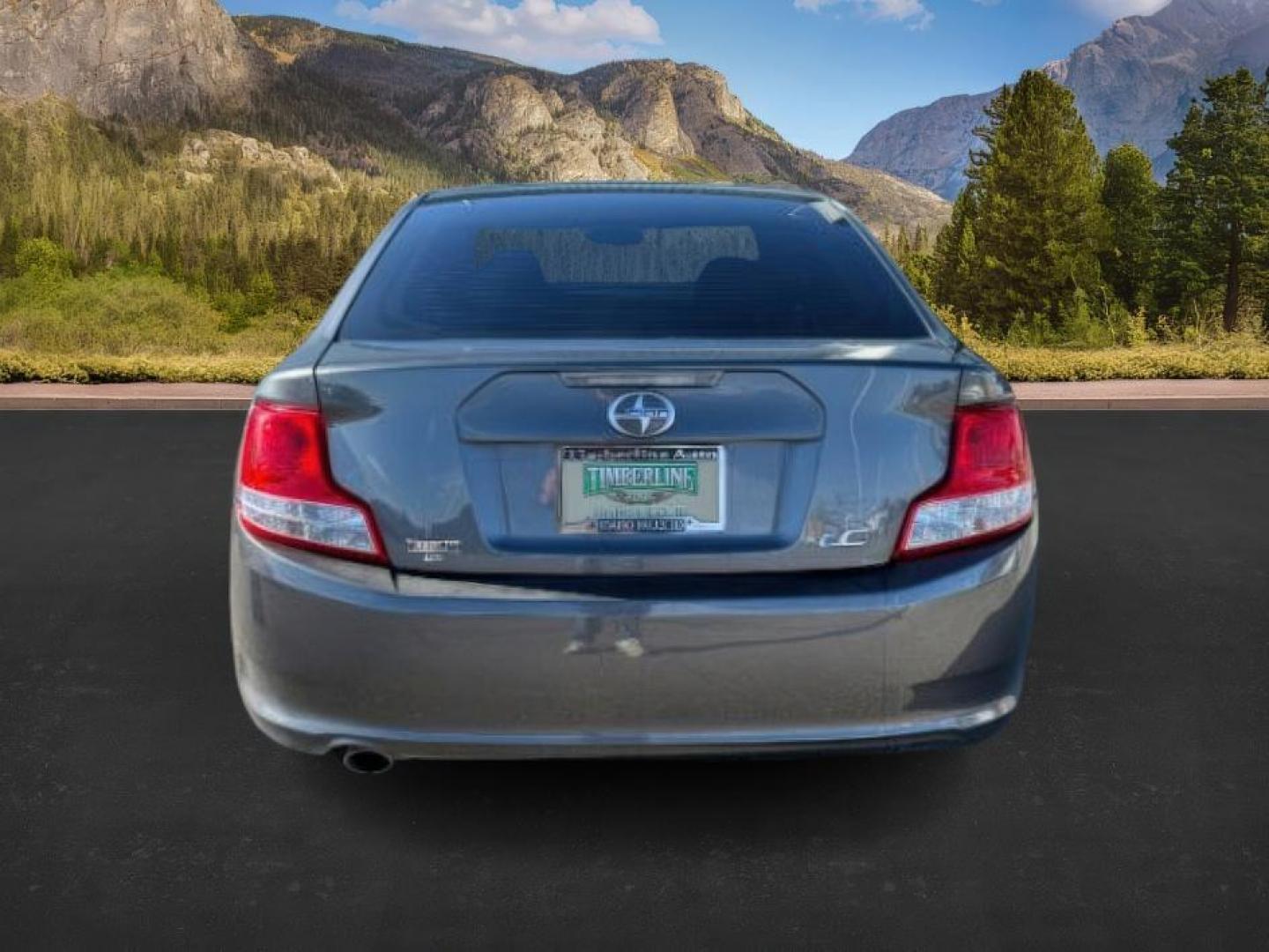 2012 Magnetic Gray Metallic /Dark Charcoal Scion tC (JTKJF5C78C3) with an 25L I-4 DOHC engine, Automatic transmission, located at 1175 N Woodruff Ave, Idaho Falls, ID, 83401, 43.506901, -111.999657 - At Timberline Auto, finding a great deal on your next vehicle is always easy! Our experienced sales staff's goal is to help find you the right vehicle at the right price! Our knowledgeable finance department has options for almost any credit score. We offer extended service contract options to prote - Photo#3