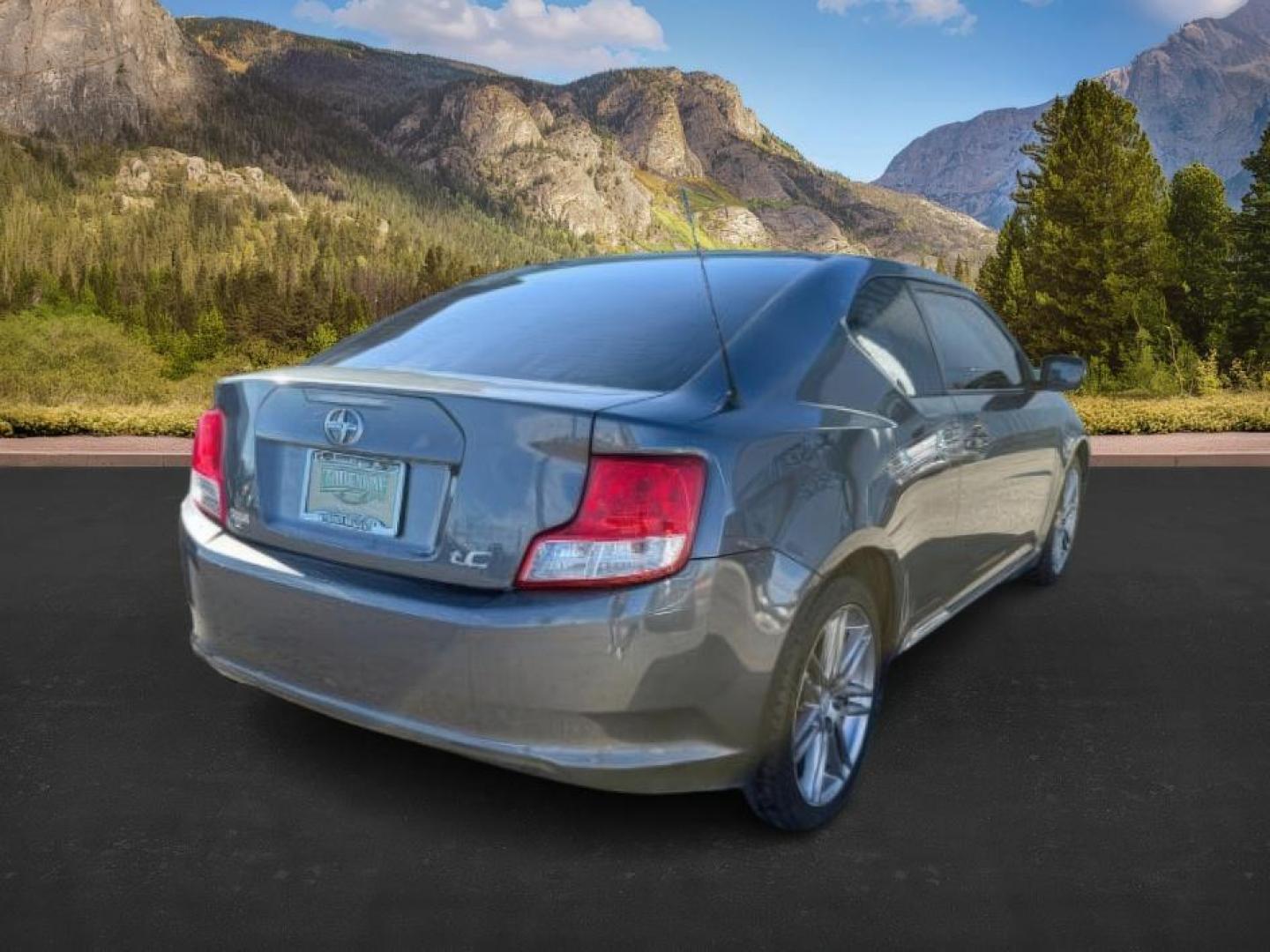 2012 Magnetic Gray Metallic /Dark Charcoal Scion tC (JTKJF5C78C3) with an 25L I-4 DOHC engine, Automatic transmission, located at 1175 N Woodruff Ave, Idaho Falls, ID, 83401, 43.506901, -111.999657 - At Timberline Auto, finding a great deal on your next vehicle is always easy! Our experienced sales staff's goal is to help find you the right vehicle at the right price! Our knowledgeable finance department has options for almost any credit score. We offer extended service contract options to prote - Photo#4