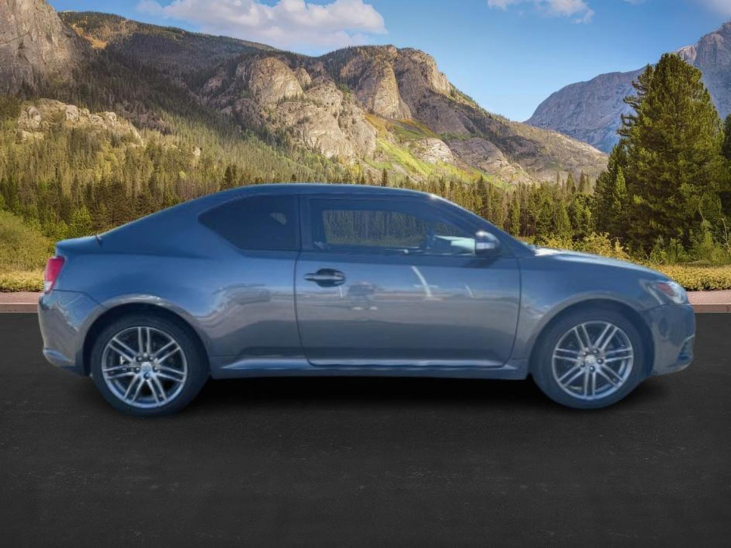 2012 Magnetic Gray Metallic /Dark Charcoal Scion tC (JTKJF5C78C3) with an 25L I-4 DOHC engine, Automatic transmission, located at 1175 N Woodruff Ave, Idaho Falls, ID, 83401, 43.506901, -111.999657 - At Timberline Auto, finding a great deal on your next vehicle is always easy! Our experienced sales staff's goal is to help find you the right vehicle at the right price! Our knowledgeable finance department has options for almost any credit score. We offer extended service contract options to prote - Photo#5