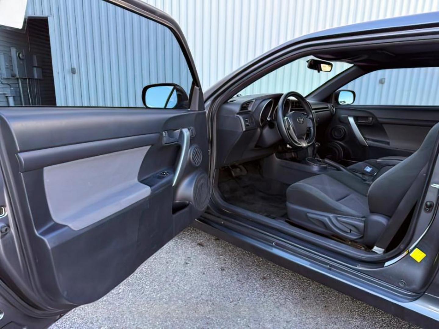 2012 Magnetic Gray Metallic /Dark Charcoal Scion tC (JTKJF5C78C3) with an 25L I-4 DOHC engine, Automatic transmission, located at 1175 N Woodruff Ave, Idaho Falls, ID, 83401, 43.506901, -111.999657 - At Timberline Auto, finding a great deal on your next vehicle is always easy! Our experienced sales staff's goal is to help find you the right vehicle at the right price! Our knowledgeable finance department has options for almost any credit score. We offer extended service contract options to prote - Photo#9