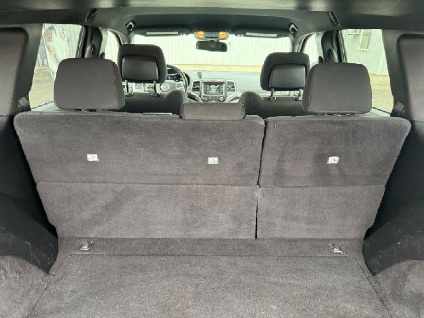 2016 Bright White Clearcoat /Black Jeep Grand Cherokee (1C4RJFAG8GC) with an Pentastar 36L V-6 DOHC engine, Automatic transmission, located at 1175 N Woodruff Ave, Idaho Falls, ID, 83401, 43.506901, -111.999657 - At Timberline Auto, finding a great deal on your next vehicle is always easy! Our experienced sales staff's goal is to help find you the right vehicle at the right price! Our knowledgeable finance department has options for almost any credit score. We offer extended service contract options to prote - Photo#26