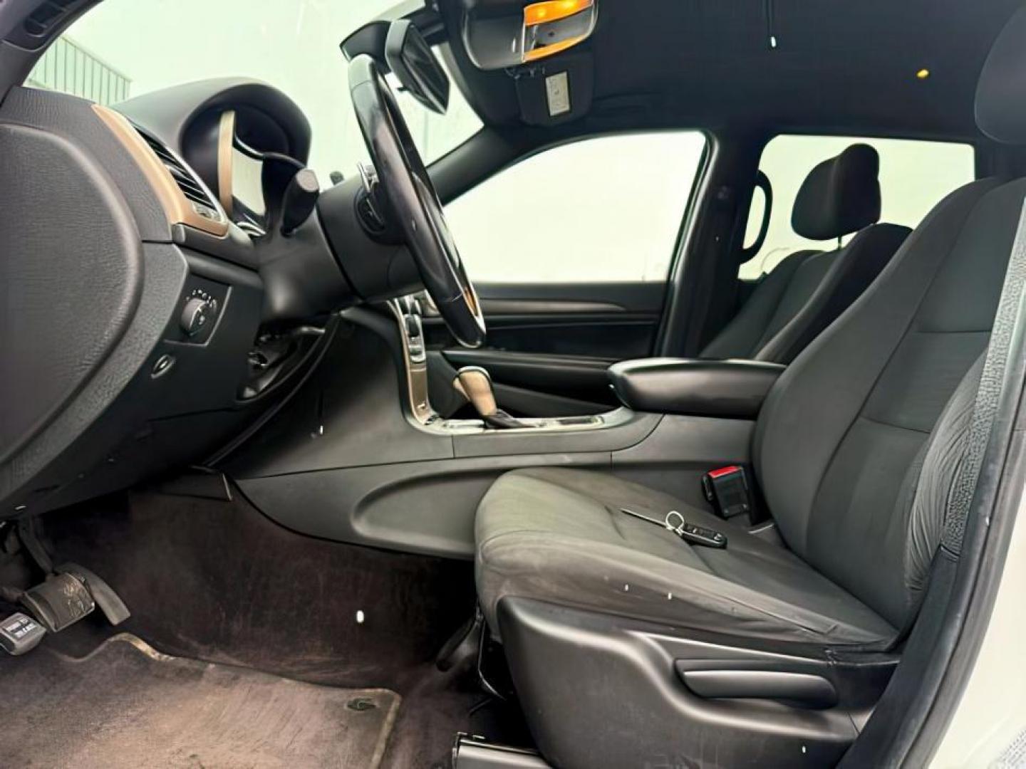 2016 Bright White Clearcoat /Black Jeep Grand Cherokee (1C4RJFAG8GC) with an Pentastar 36L V-6 DOHC engine, Automatic transmission, located at 1175 N Woodruff Ave, Idaho Falls, ID, 83401, 43.506901, -111.999657 - At Timberline Auto, finding a great deal on your next vehicle is always easy! Our experienced sales staff's goal is to help find you the right vehicle at the right price! Our knowledgeable finance department has options for almost any credit score. We offer extended service contract options to prote - Photo#12