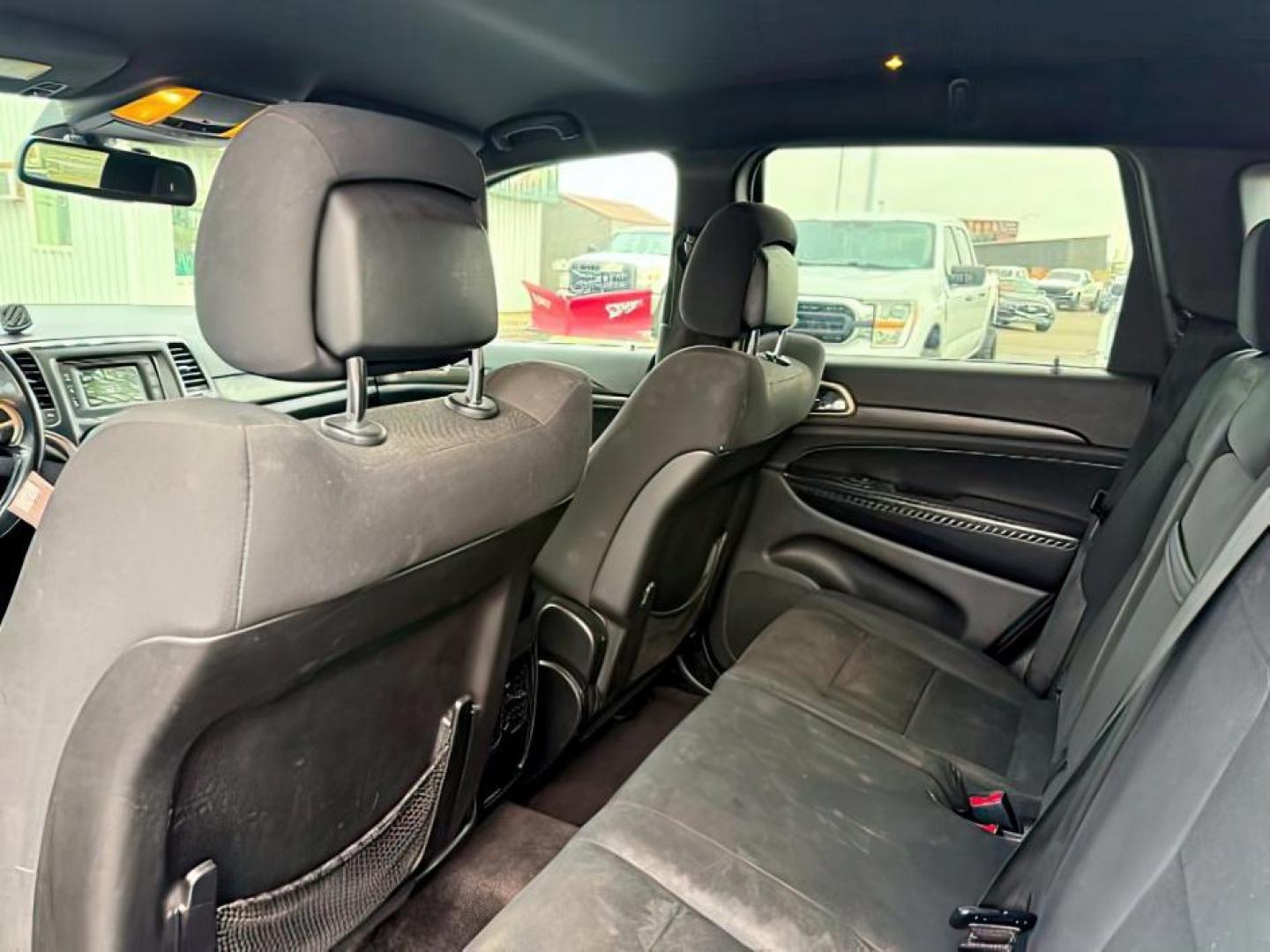 2016 Bright White Clearcoat /Black Jeep Grand Cherokee (1C4RJFAG8GC) with an Pentastar 36L V-6 DOHC engine, Automatic transmission, located at 1175 N Woodruff Ave, Idaho Falls, ID, 83401, 43.506901, -111.999657 - At Timberline Auto, finding a great deal on your next vehicle is always easy! Our experienced sales staff's goal is to help find you the right vehicle at the right price! Our knowledgeable finance department has options for almost any credit score. We offer extended service contract options to prote - Photo#20