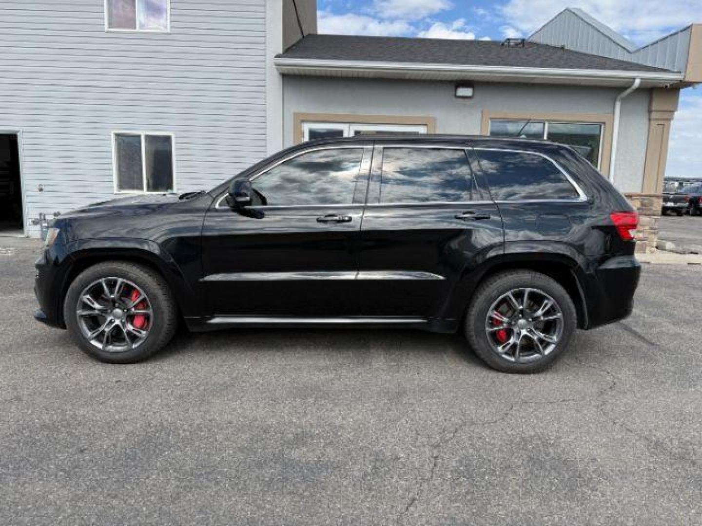 2012 Brilliant Black Crystal Pearl /Black Leather Interior With Preferred Suede Jeep Grand Cherokee (1C4RJFDJXCC) with an 64L V8 OHV 16V engine, Automatic transmission, located at 1175 N Woodruff Ave, Idaho Falls, ID, 83401, 43.506901, -111.999657 - At Timberline Auto, finding a great deal on your next vehicle is always easy! Our experienced sales staff's goal is to help find you the right vehicle at the right price! Our knowledgeable finance department has options for almost any credit score. We offer extended service contract options to prote - Photo#0