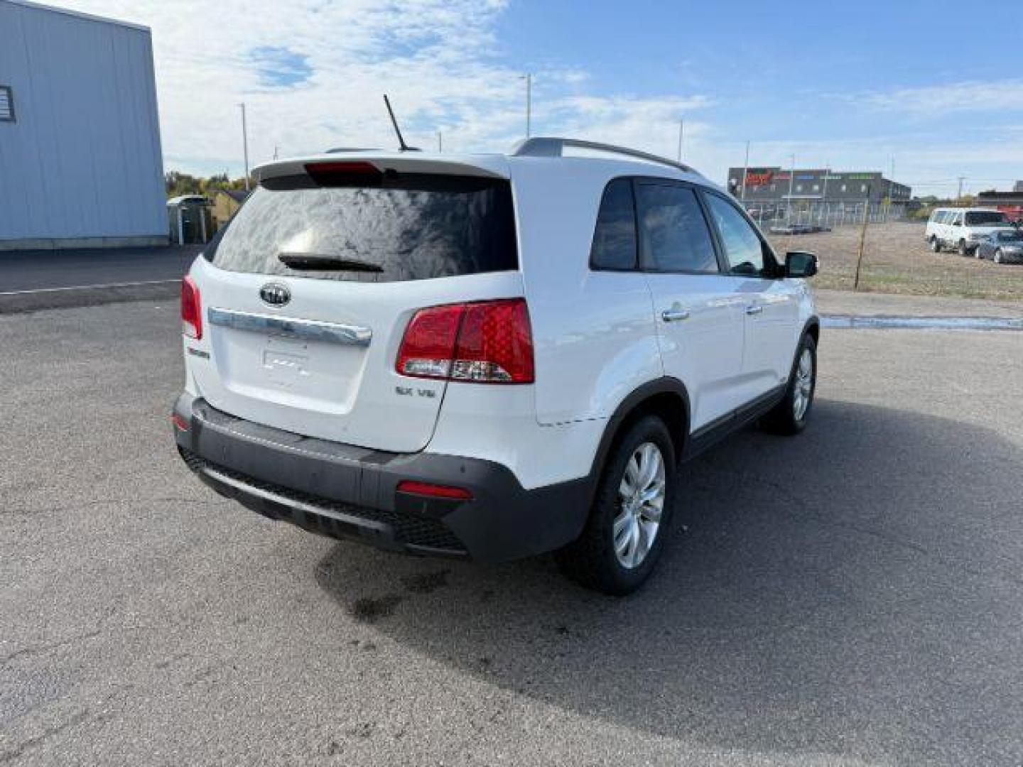 2011 Snow White Pearl /Black KIA Sorento (5XYKUDA20BG) with an 35L V-6 DOHC engine, Automatic transmission, located at 1175 N Woodruff Ave, Idaho Falls, ID, 83401, 43.506901, -111.999657 - At Timberline Auto, finding a great deal on your next vehicle is always easy! Our experienced sales staff's goal is to help find you the right vehicle at the right price! Our knowledgeable finance department has options for almost any credit score. We offer extended service contract options to prote - Photo#26