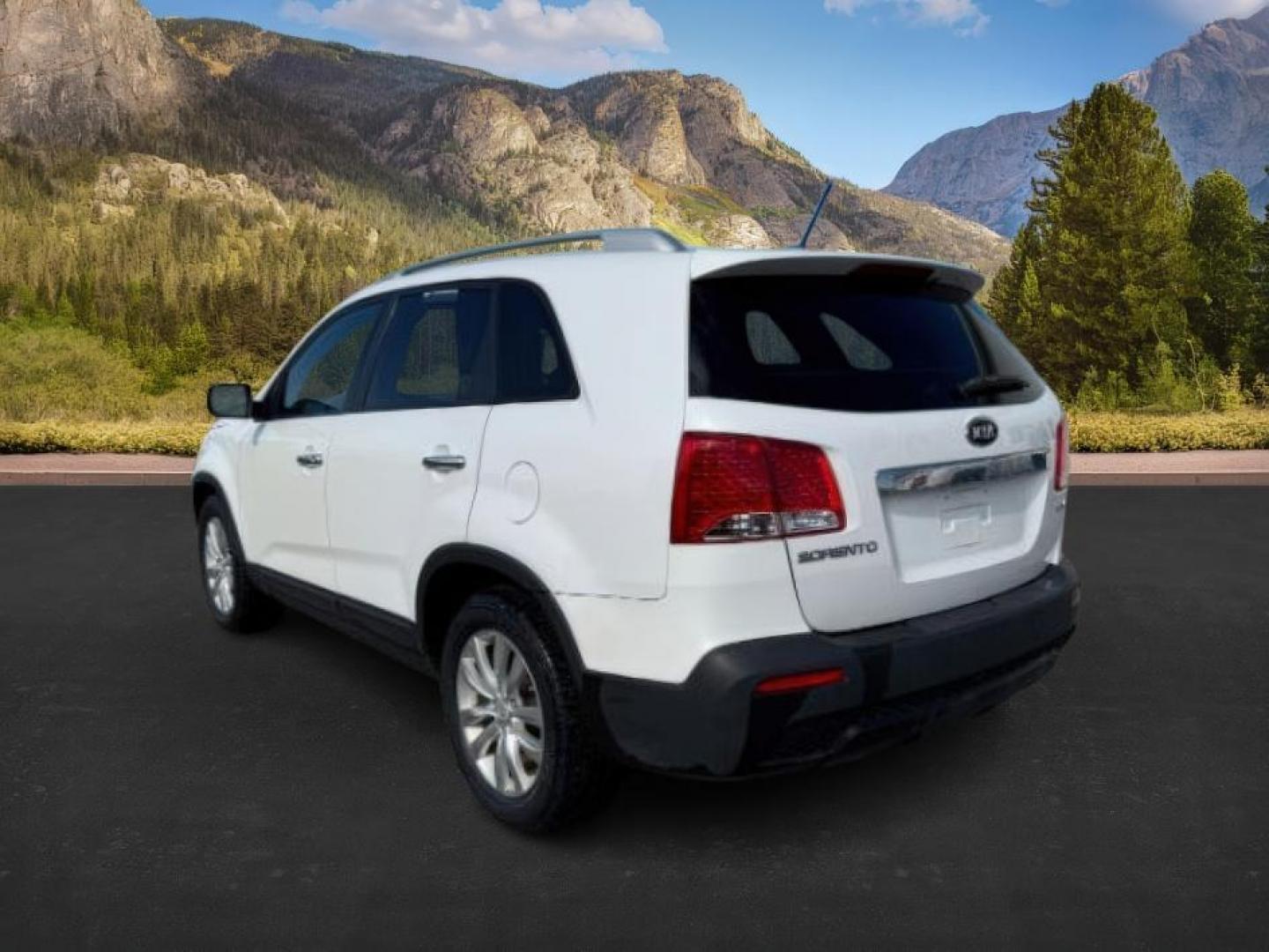 2011 Snow White Pearl /Black KIA Sorento (5XYKUDA20BG) with an 35L V-6 DOHC engine, Automatic transmission, located at 1175 N Woodruff Ave, Idaho Falls, ID, 83401, 43.506901, -111.999657 - At Timberline Auto, finding a great deal on your next vehicle is always easy! Our experienced sales staff's goal is to help find you the right vehicle at the right price! Our knowledgeable finance department has options for almost any credit score. We offer extended service contract options to prote - Photo#2