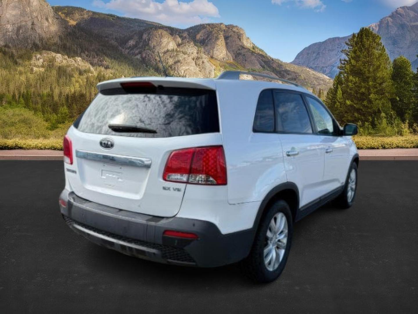 2011 Snow White Pearl /Black KIA Sorento (5XYKUDA20BG) with an 35L V-6 DOHC engine, Automatic transmission, located at 1175 N Woodruff Ave, Idaho Falls, ID, 83401, 43.506901, -111.999657 - At Timberline Auto, finding a great deal on your next vehicle is always easy! Our experienced sales staff's goal is to help find you the right vehicle at the right price! Our knowledgeable finance department has options for almost any credit score. We offer extended service contract options to prote - Photo#5