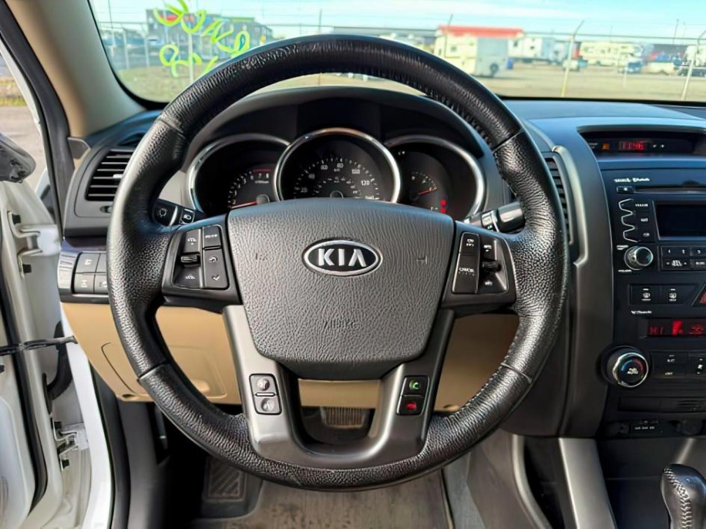 2011 Snow White Pearl /Black KIA Sorento (5XYKUDA20BG) with an 35L V-6 DOHC engine, Automatic transmission, located at 1175 N Woodruff Ave, Idaho Falls, ID, 83401, 43.506901, -111.999657 - At Timberline Auto, finding a great deal on your next vehicle is always easy! Our experienced sales staff's goal is to help find you the right vehicle at the right price! Our knowledgeable finance department has options for almost any credit score. We offer extended service contract options to prote - Photo#13