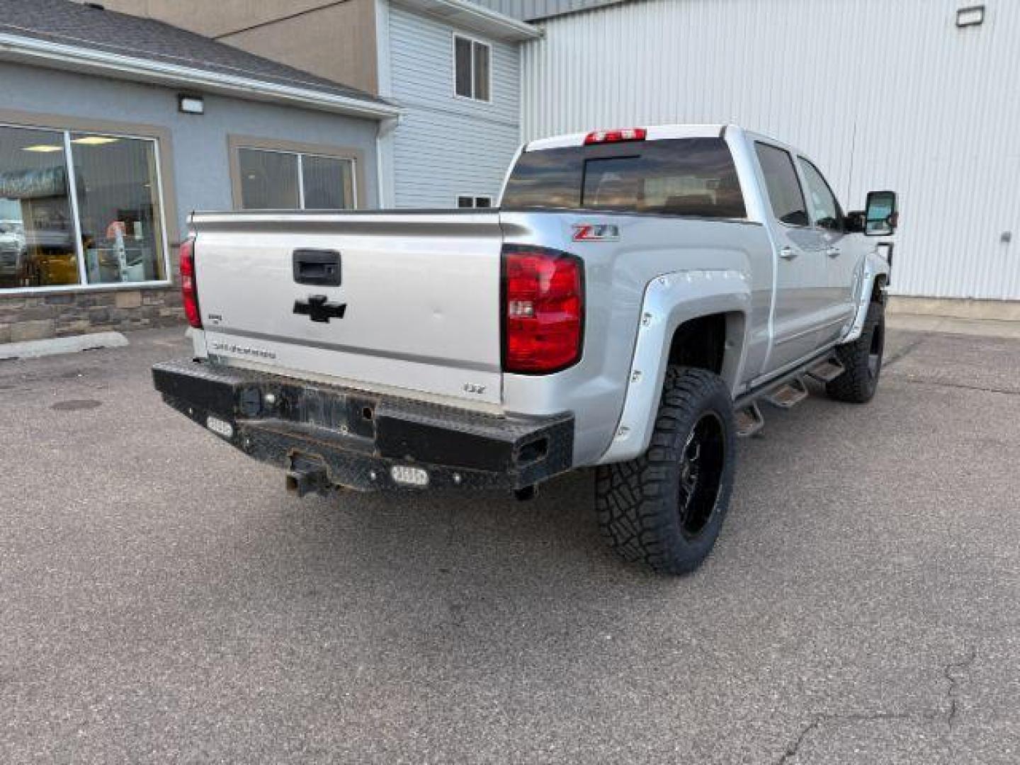 2016 Silver Ice Metallic /Jet Black Chevrolet Silverado 2500HD (1GC1KWE8XGF) with an 66L V8 16V OHV TURBO DIESEL engine, Automatic transmission, located at 1175 N Woodruff Ave, Idaho Falls, ID, 83401, 43.506901, -111.999657 - At Timberline Auto, finding a great deal on your next vehicle is always easy! Our experienced sales staff's goal is to help find you the right vehicle at the right price! Our knowledgeable finance department has options for almost any credit score. We offer extended service contract options to prote - Photo#32