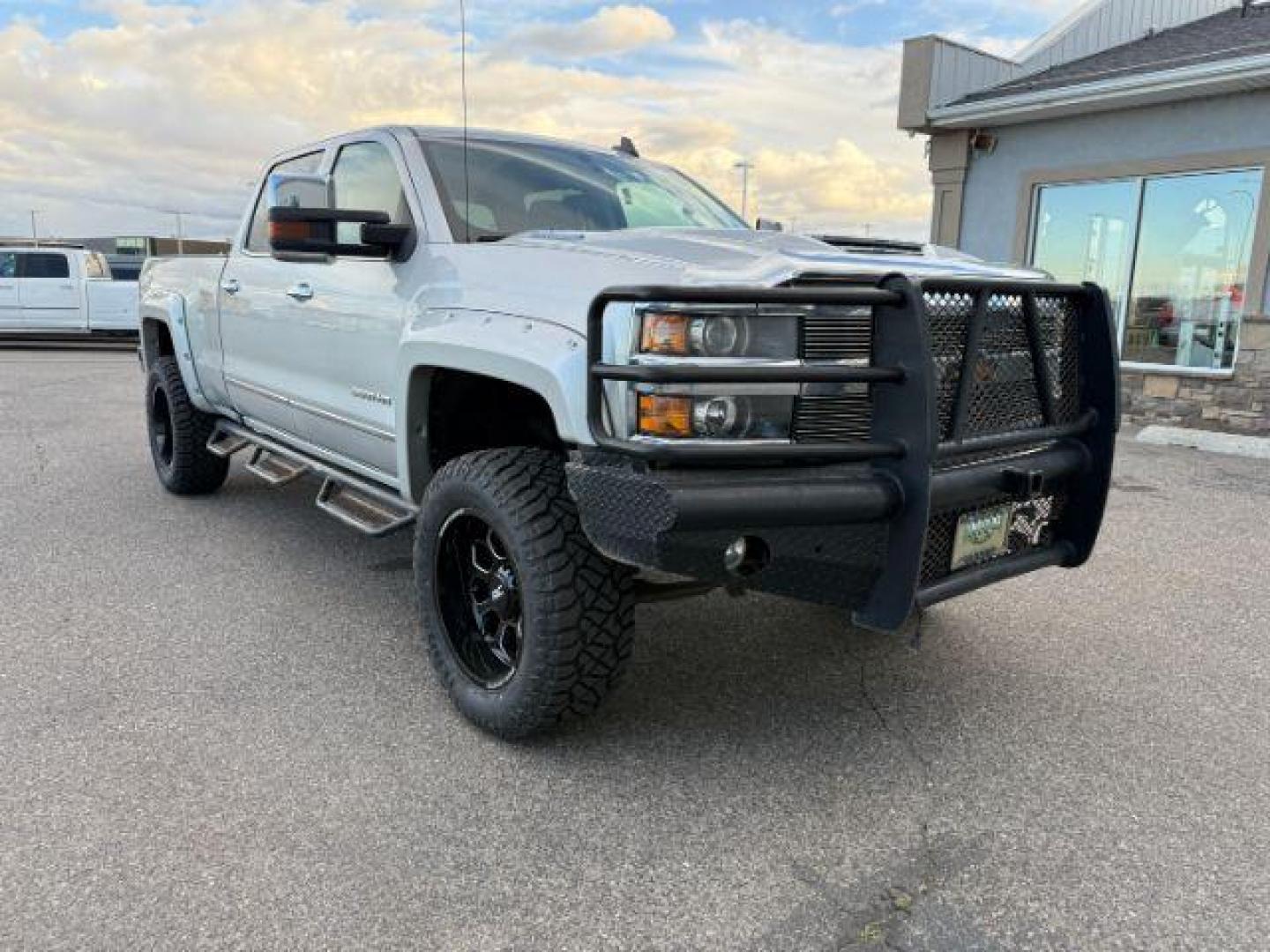 2016 Silver Ice Metallic /Jet Black Chevrolet Silverado 2500HD (1GC1KWE8XGF) with an 66L V8 16V OHV TURBO DIESEL engine, Automatic transmission, located at 1175 N Woodruff Ave, Idaho Falls, ID, 83401, 43.506901, -111.999657 - At Timberline Auto, finding a great deal on your next vehicle is always easy! Our experienced sales staff's goal is to help find you the right vehicle at the right price! Our knowledgeable finance department has options for almost any credit score. We offer extended service contract options to prote - Photo#34