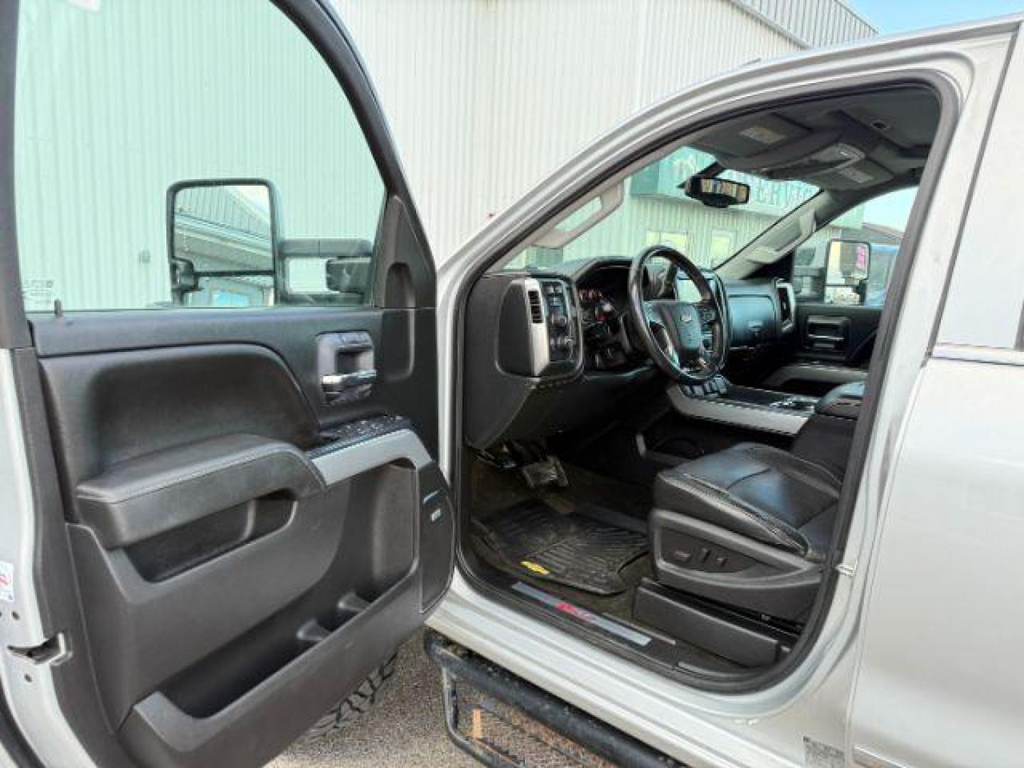 2016 Silver Ice Metallic /Jet Black Chevrolet Silverado 2500HD (1GC1KWE8XGF) with an 66L V8 16V OHV TURBO DIESEL engine, Automatic transmission, located at 1175 N Woodruff Ave, Idaho Falls, ID, 83401, 43.506901, -111.999657 - At Timberline Auto, finding a great deal on your next vehicle is always easy! Our experienced sales staff's goal is to help find you the right vehicle at the right price! Our knowledgeable finance department has options for almost any credit score. We offer extended service contract options to prote - Photo#38