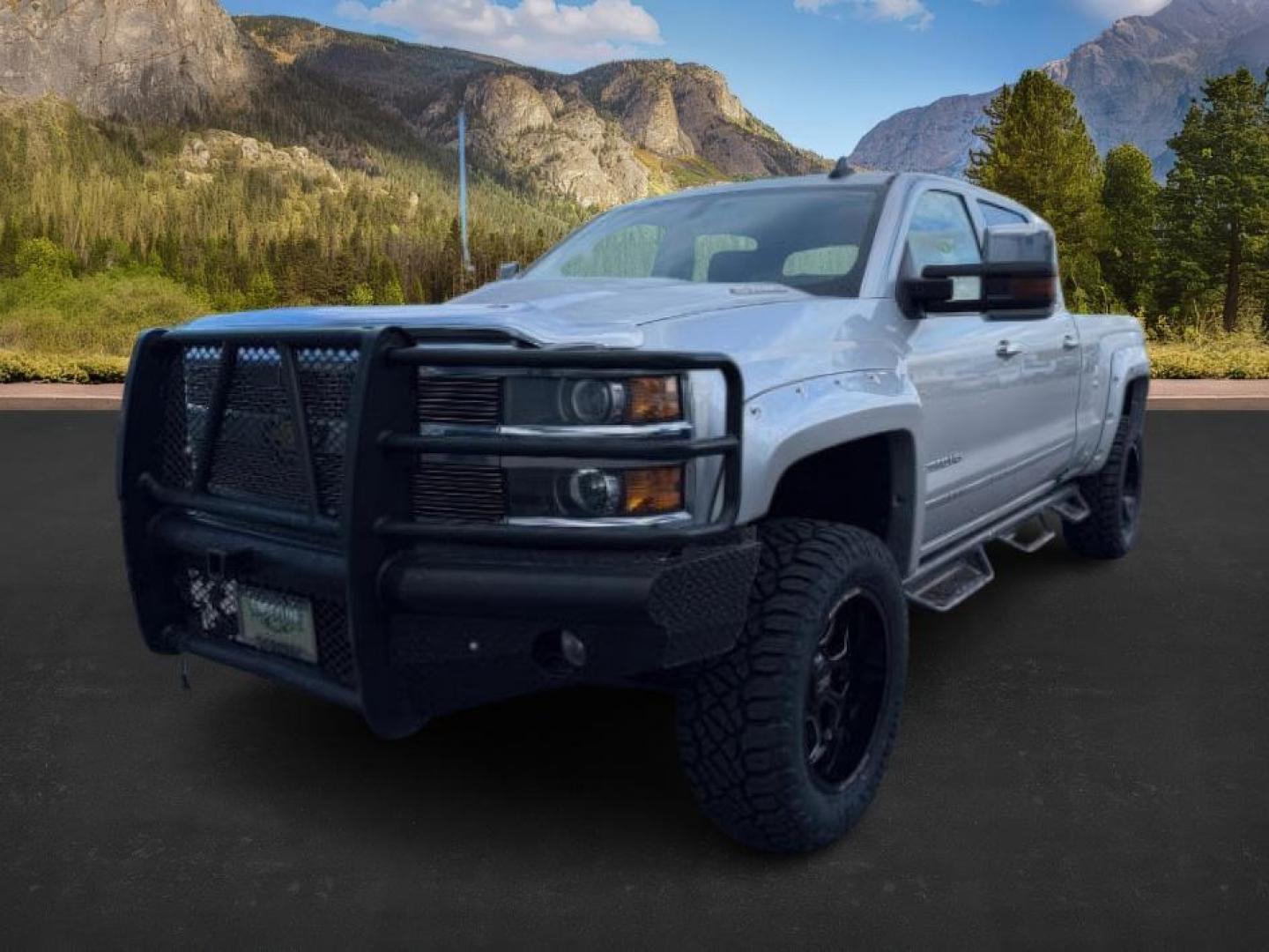 2016 Silver Ice Metallic /Jet Black Chevrolet Silverado 2500HD (1GC1KWE8XGF) with an 66L V8 16V OHV TURBO DIESEL engine, Automatic transmission, located at 1175 N Woodruff Ave, Idaho Falls, ID, 83401, 43.506901, -111.999657 - At Timberline Auto, finding a great deal on your next vehicle is always easy! Our experienced sales staff's goal is to help find you the right vehicle at the right price! Our knowledgeable finance department has options for almost any credit score. We offer extended service contract options to prote - Photo#0