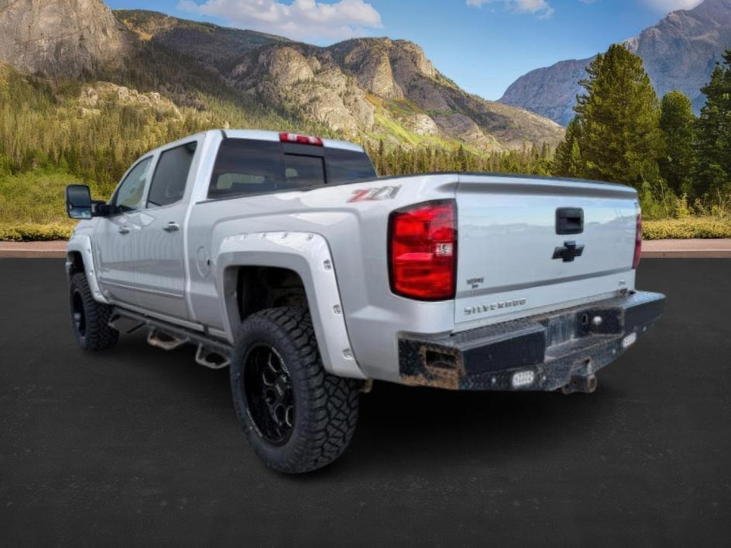 2016 Silver Ice Metallic /Jet Black Chevrolet Silverado 2500HD (1GC1KWE8XGF) with an 66L V8 16V OHV TURBO DIESEL engine, Automatic transmission, located at 1175 N Woodruff Ave, Idaho Falls, ID, 83401, 43.506901, -111.999657 - At Timberline Auto, finding a great deal on your next vehicle is always easy! Our experienced sales staff's goal is to help find you the right vehicle at the right price! Our knowledgeable finance department has options for almost any credit score. We offer extended service contract options to prote - Photo#2