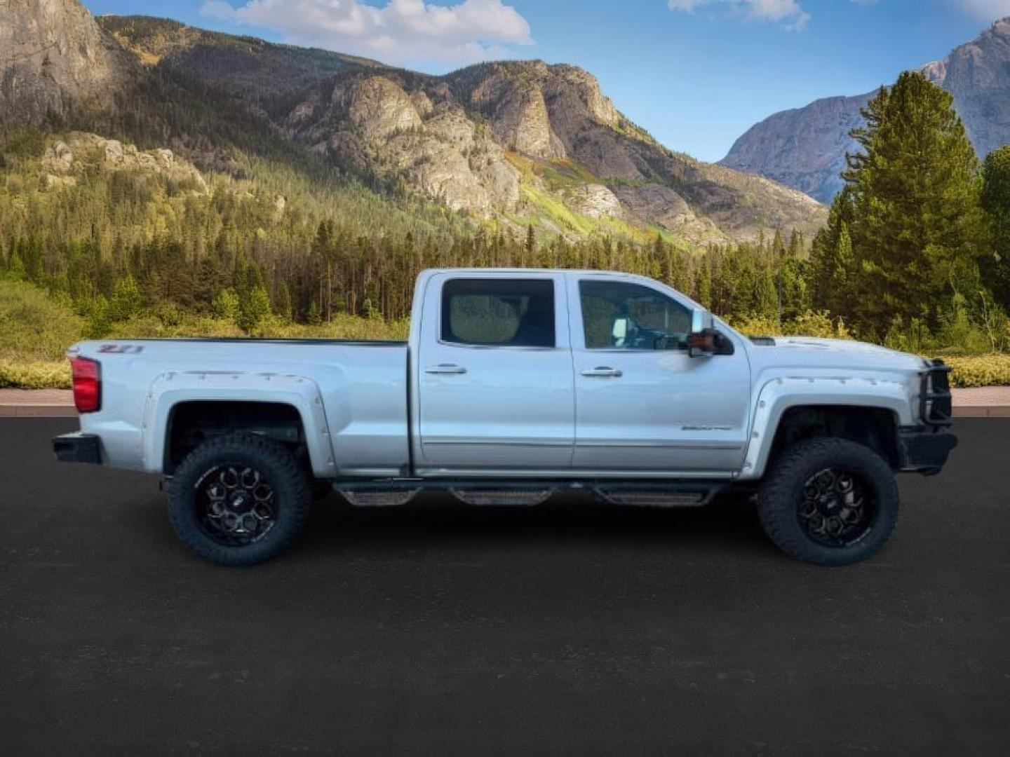 2016 Silver Ice Metallic /Jet Black Chevrolet Silverado 2500HD (1GC1KWE8XGF) with an 66L V8 16V OHV TURBO DIESEL engine, Automatic transmission, located at 1175 N Woodruff Ave, Idaho Falls, ID, 83401, 43.506901, -111.999657 - At Timberline Auto, finding a great deal on your next vehicle is always easy! Our experienced sales staff's goal is to help find you the right vehicle at the right price! Our knowledgeable finance department has options for almost any credit score. We offer extended service contract options to prote - Photo#7