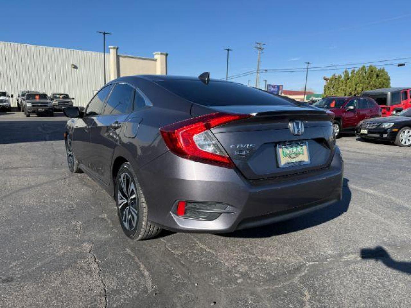 2017 GRAY /Black Honda Civic (19XFC1F35HE) with an 15L I-4 gasoline direct injection engine, Automatic transmission, located at 1175 N Woodruff Ave, Idaho Falls, ID, 83401, 43.506901, -111.999657 - At Timberline Auto, finding a great deal on your next vehicle is always easy! Our experienced sales staff's goal is to help find you the right vehicle at the right price! Our knowledgeable finance department has options for almost any credit score. We offer extended service contract options to prote - Photo#23
