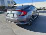 2017 GRAY /Black Honda Civic (19XFC1F35HE) with an 15L I-4 gasoline direct injection engine, Automatic transmission, located at 1175 N Woodruff Ave, Idaho Falls, ID, 83401, 43.506901, -111.999657 - At Timberline Auto, finding a great deal on your next vehicle is always easy! Our experienced sales staff's goal is to help find you the right vehicle at the right price! Our knowledgeable finance department has options for almost any credit score. We offer extended service contract options to prote - Photo#26